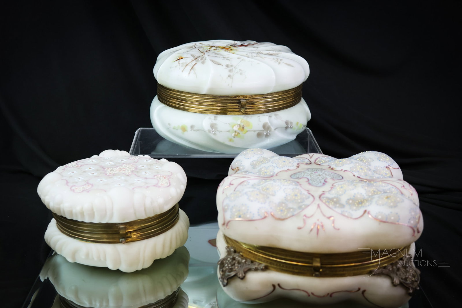 3 pc Lot Victorian Glass Wavecrest Dresser Boxes: A nice array of Victorian Wavecrest glass dresser boxes. The first is an egg-crate mold with petit-point flowers. The second is a swirl mold with floral decoration. The third box is much smaller and i