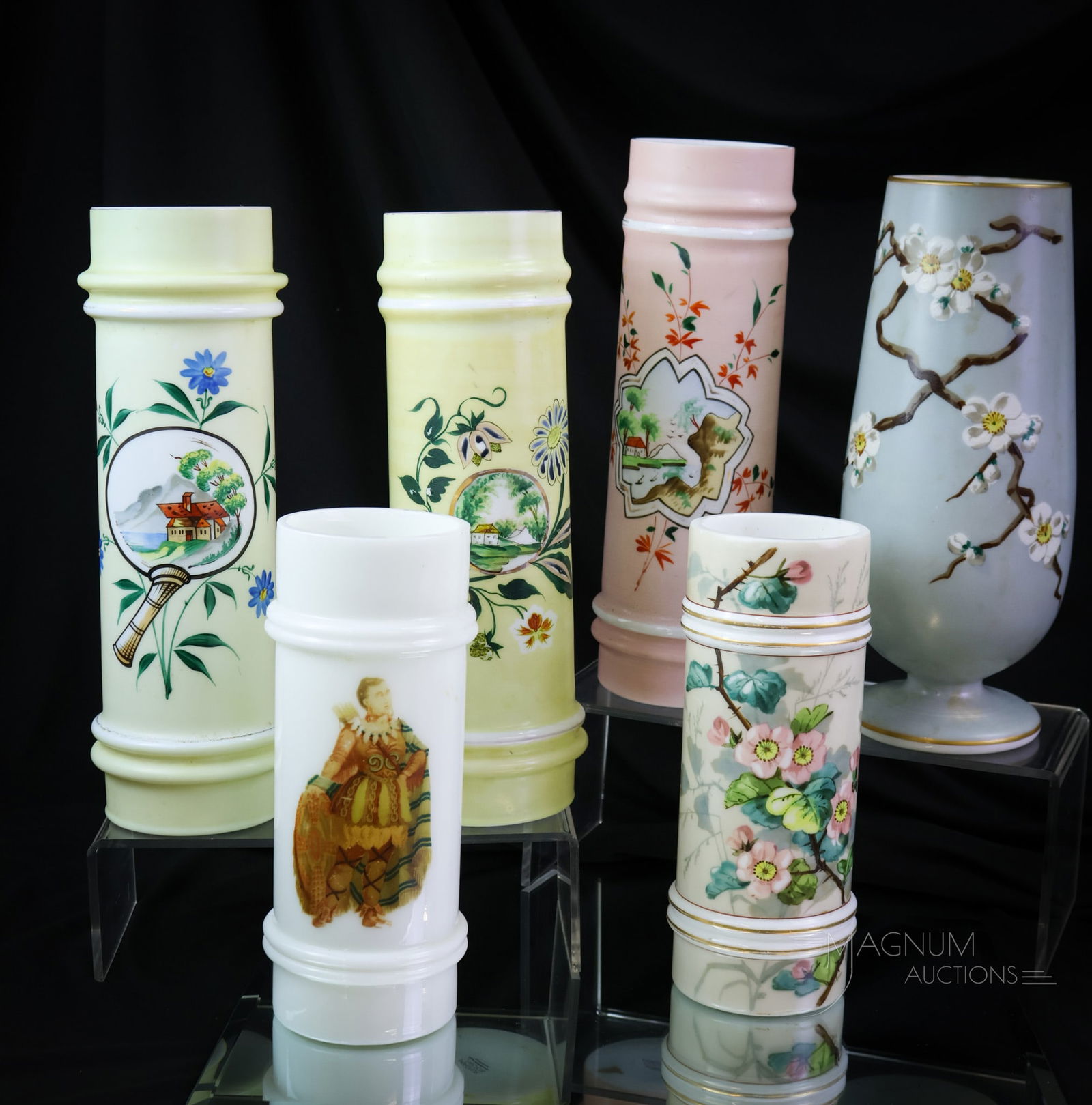6 pc Lot Smith Bros. Victorian Glass Cylinder Vases: A Generous offering of unique, attributed to Smith Bros. Victorian glass vases. This lot has an array of colors and decorations. Each will certainly be a collection-enhancing piece. The tallest measur