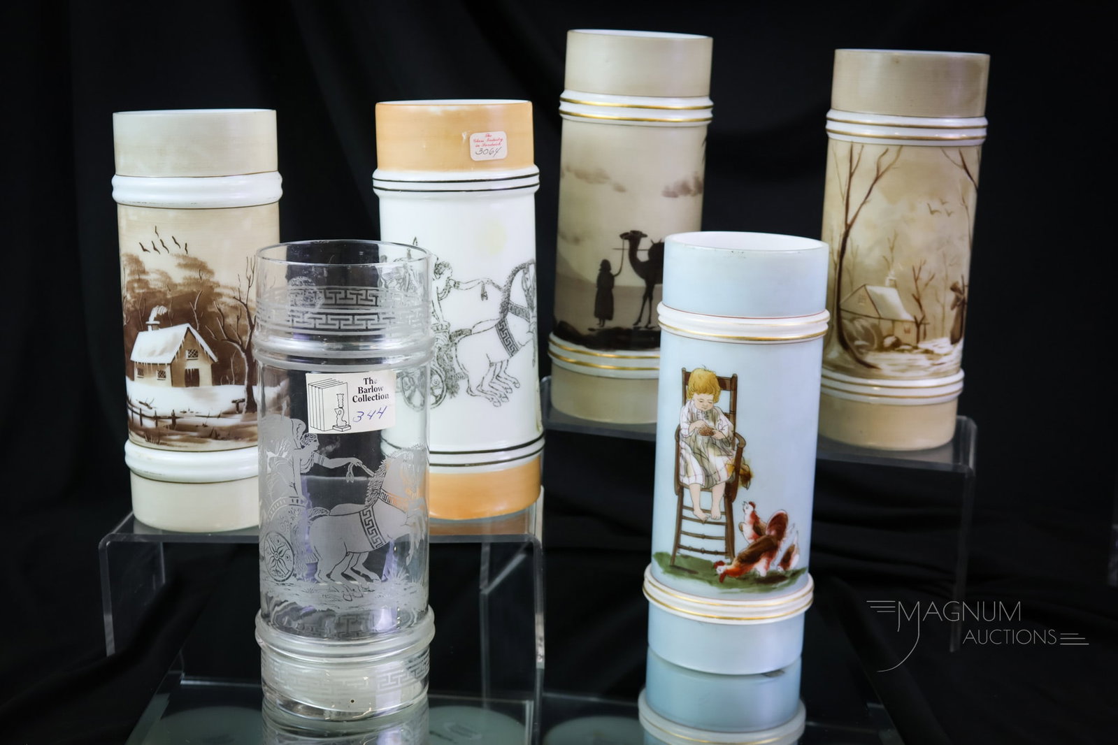 6 pc Lot Smith Bros. Victorian Glass Cylinder Vases: Another select offering attributed to Smith Bros. decorated Victorian glass cylinder vases. There is a pair of vases decorated with log cabin scenes. One with a Roman chariot scene. A clear with a Rom