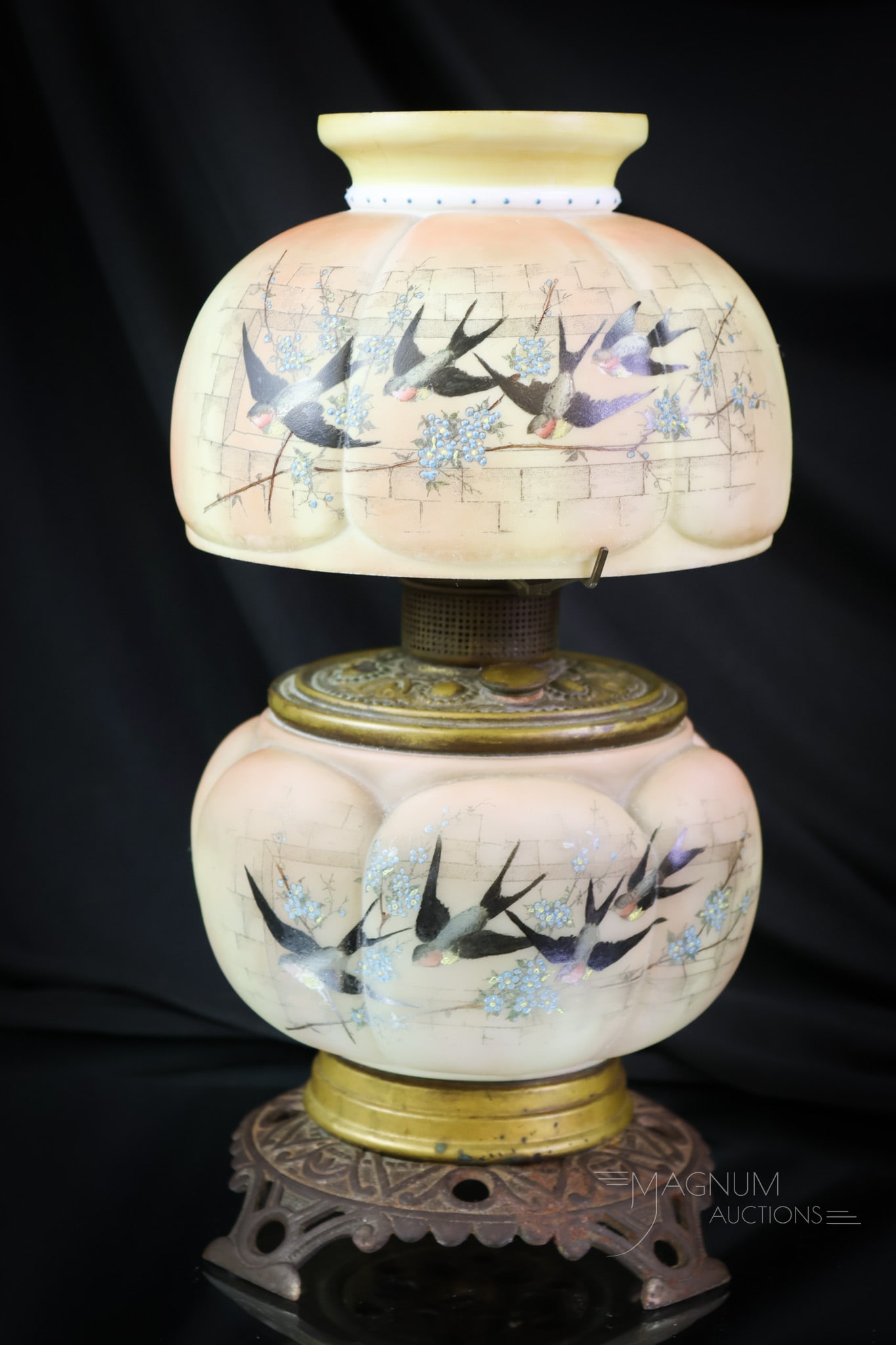 Smith Bros. Victorian Glass Junior Size Parlor Oil Lamp: A most unusual size for a lamp. This is a junior "fun" sized Victorfian parlor melon ribbed decorated parlor lamp. The lamp remains oil. It is decorated with swallows. The lamp measures 11 1/2" tall a