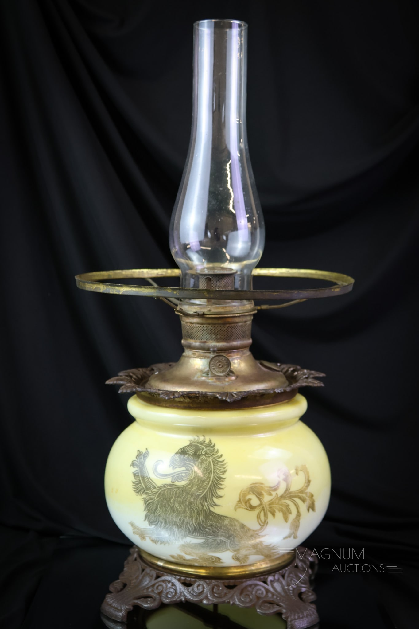 Victorian Rampant Lion Decorated Gone with the Wind Lamp: A nice find in a Victorian Gone with the Wind lamp base. This one is decorated with a rampant lion motif. The lamp retains its original fittings but has been electrified. The lamp base measures 12" ta