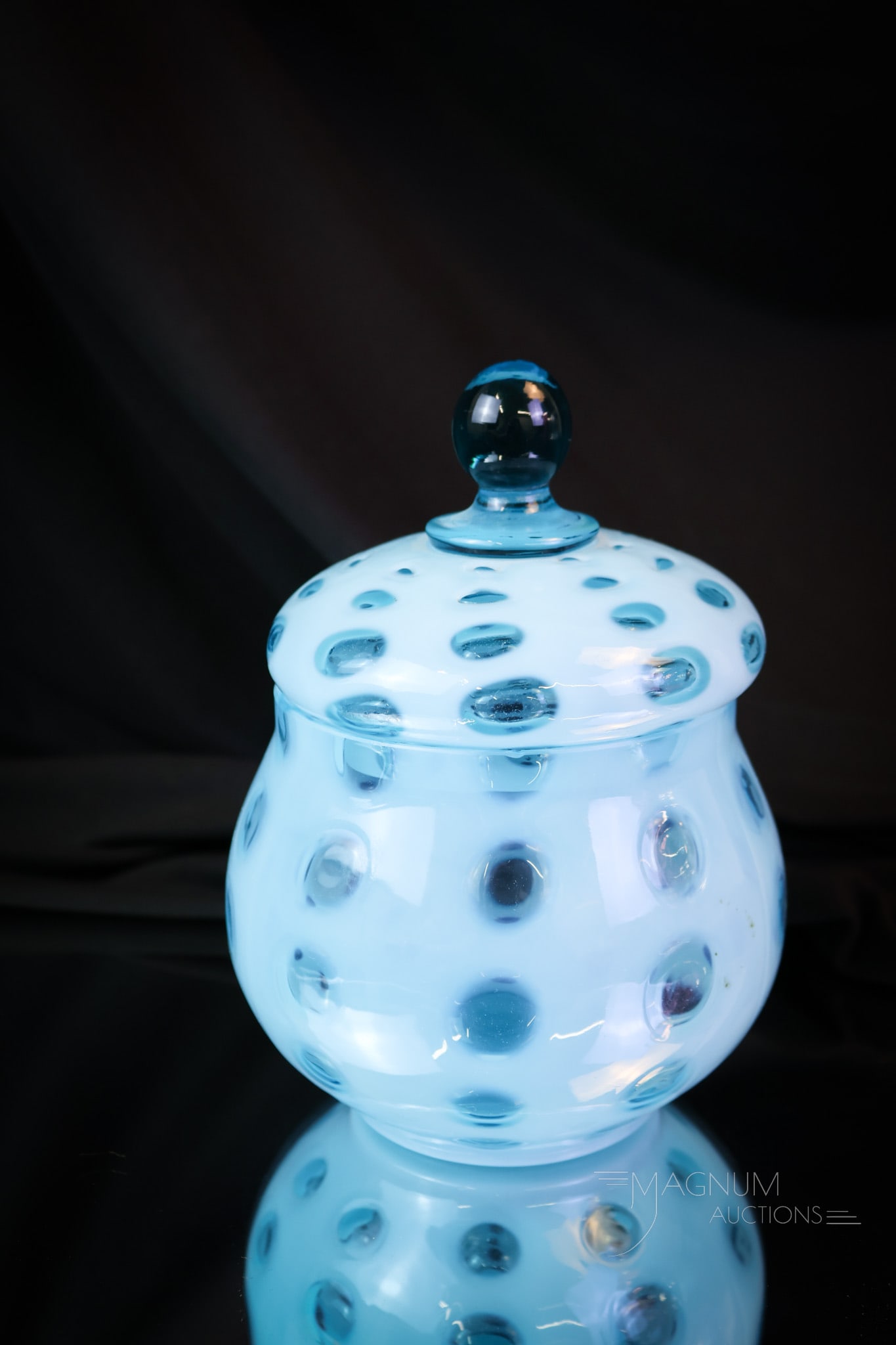 Blue Opalescent Victorian Glass Covered Sugar Bowl: A striking find in Victorian blue opalescent glass. This is a covered sugar bowl in the Polka Dot pattern. The piece is a tough find if you need it to complete your set. The sugar bowl measures 6" tal