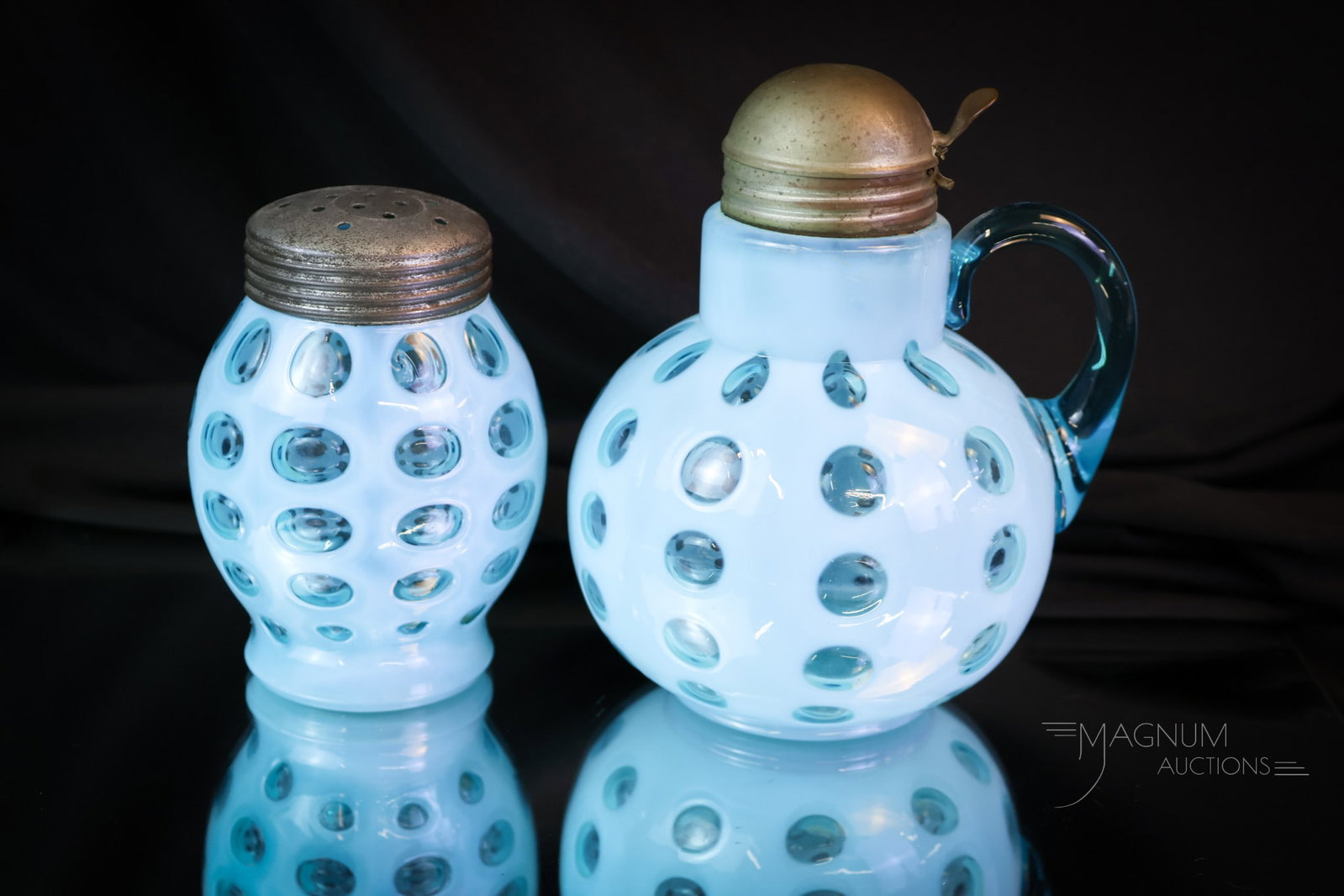 2 pc Lot Victorian Blue Opalescent Sugar Shaker & Syrup Pitcher: Two very strong examples of blue opalescent Victorian glass in the form of a sugar shaker and a syrup pitcher. Each a lovely example. The tallest measures 6". SHIPPING NOTICE: If you choose not to uti