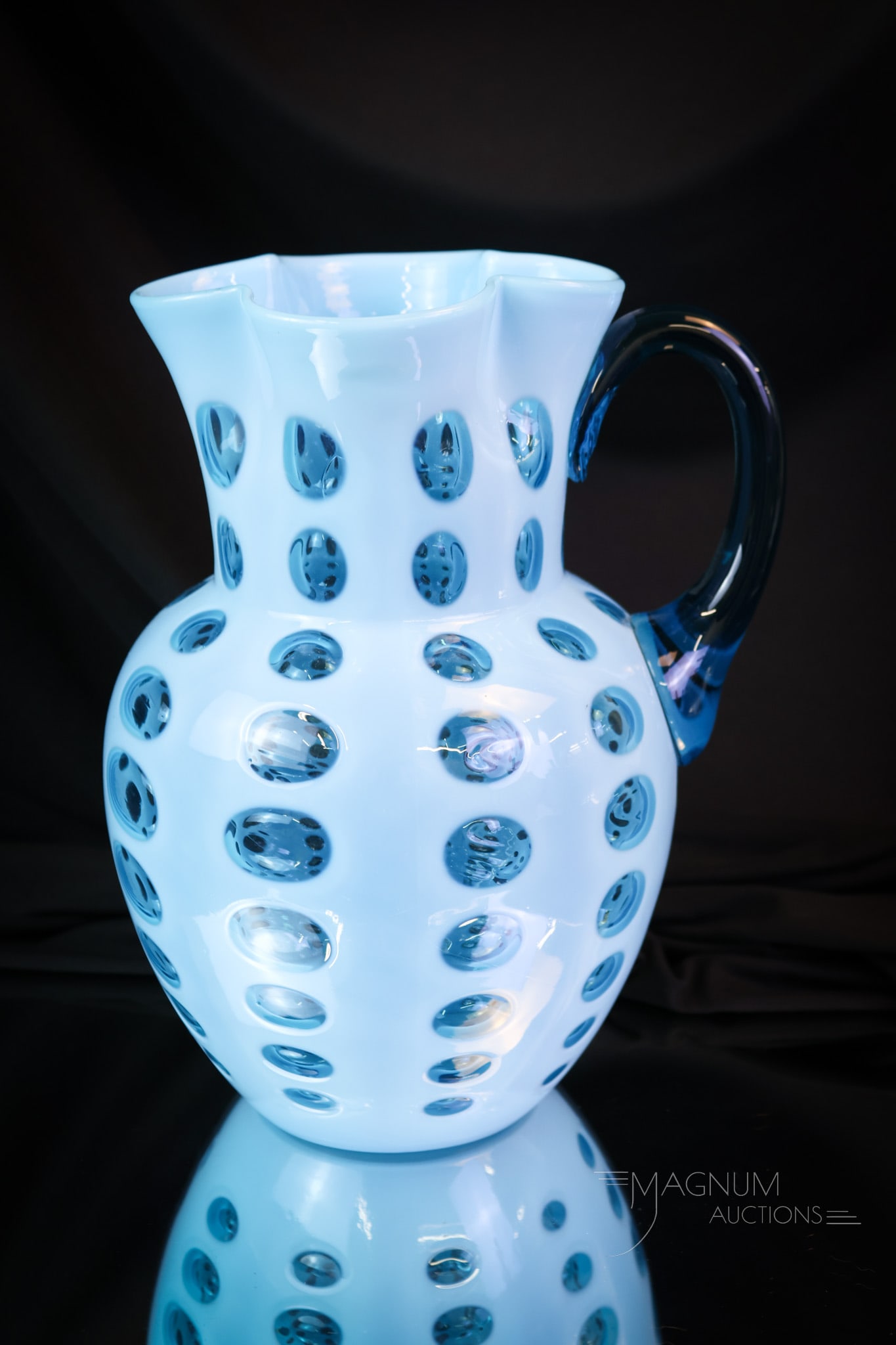 West Virginia Blue Opalescent Polka Dot Victorian Glass Water Pitcher: This beautiful and striking pitcher is complete with a clover top rim, beautiful coloring, and amazing opalescence. The pitcher measures 9 1/4" tall. SHIPPING NOTICE: If you choose not to utilize the 