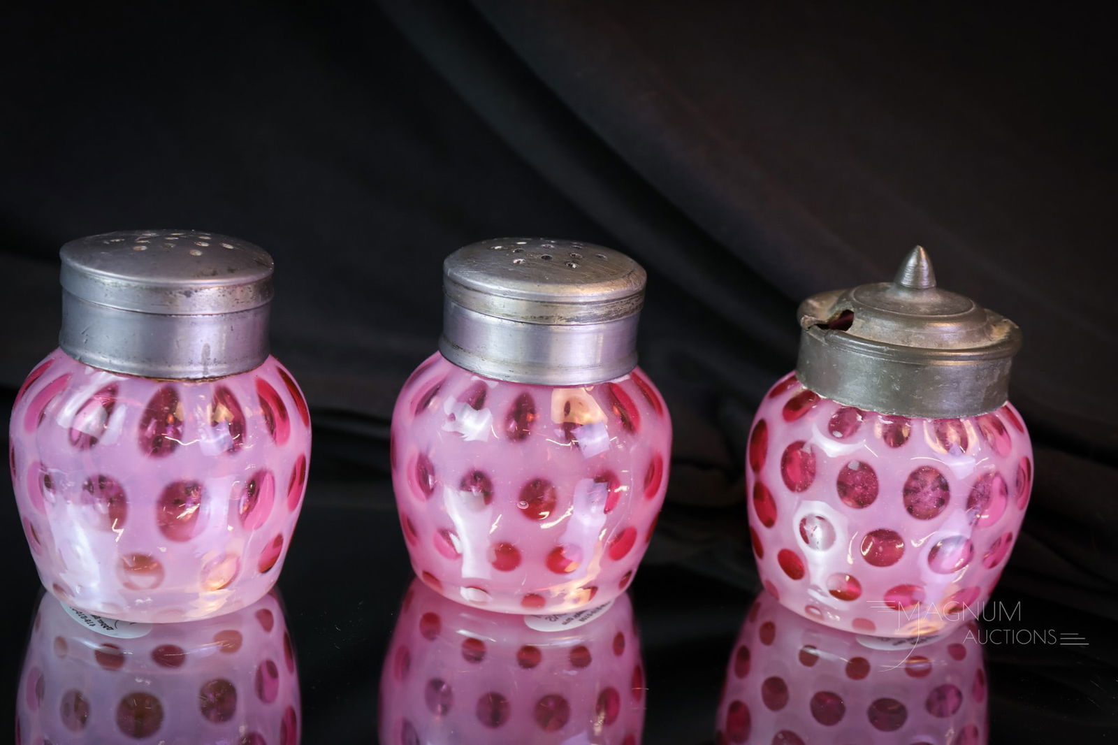 Rare 3 pc Set Victorian Phoenix Cranberry Opalescent Honeycomb Salt Shakers & Mustard Jar: Yet another rare find presented by Magnum Auctions. This is a set of three pieces attributed to Phoenix glass. These are in cranberry opalescent glass in the Honeycomb pattern. There's a pair of salt