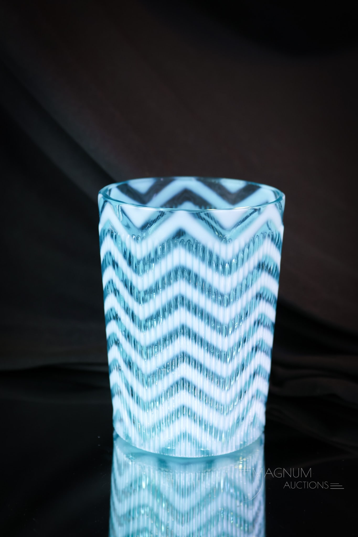 Northwood Blue Opalescent Ribbed Herringbone Victorian Glass Tumbler: A brilliant find in the Northwood Ribbed Herringbone pattern. This is a tumbler. Strong opal and perfect pattern, and color make this a collection-enhancing piece. The tumbler measures 3 3/4" tall and