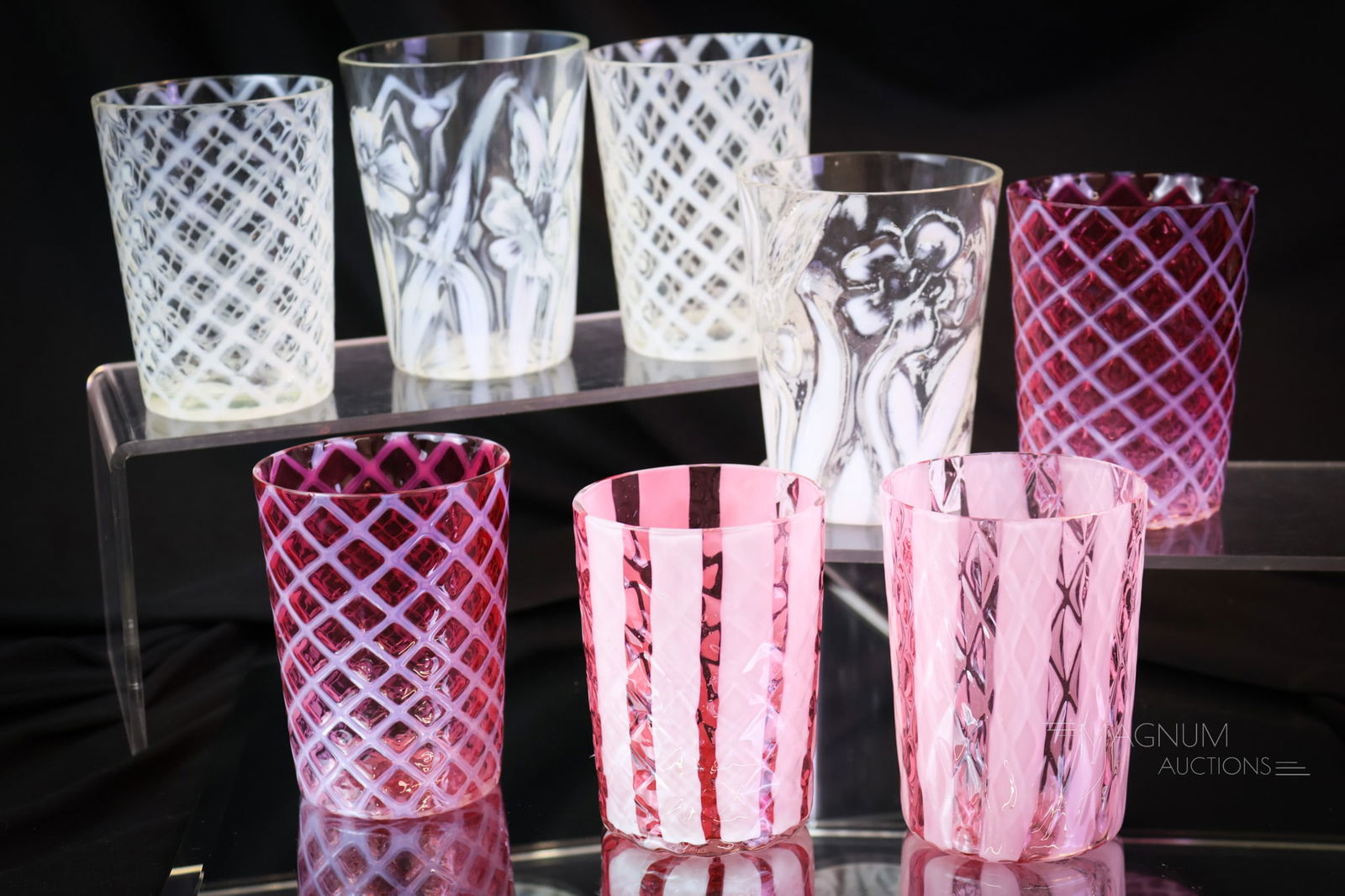 8 pc Lot Victorian Opalescent Glass Tumblers: Eight desirable tumblers in Victorian opalescent glass. This lot combines a variety for your bidding pleasure. There are 2 cranberry Diamond-Quilt Wide Stripe. Two in white opal Daffodil pattern. Two