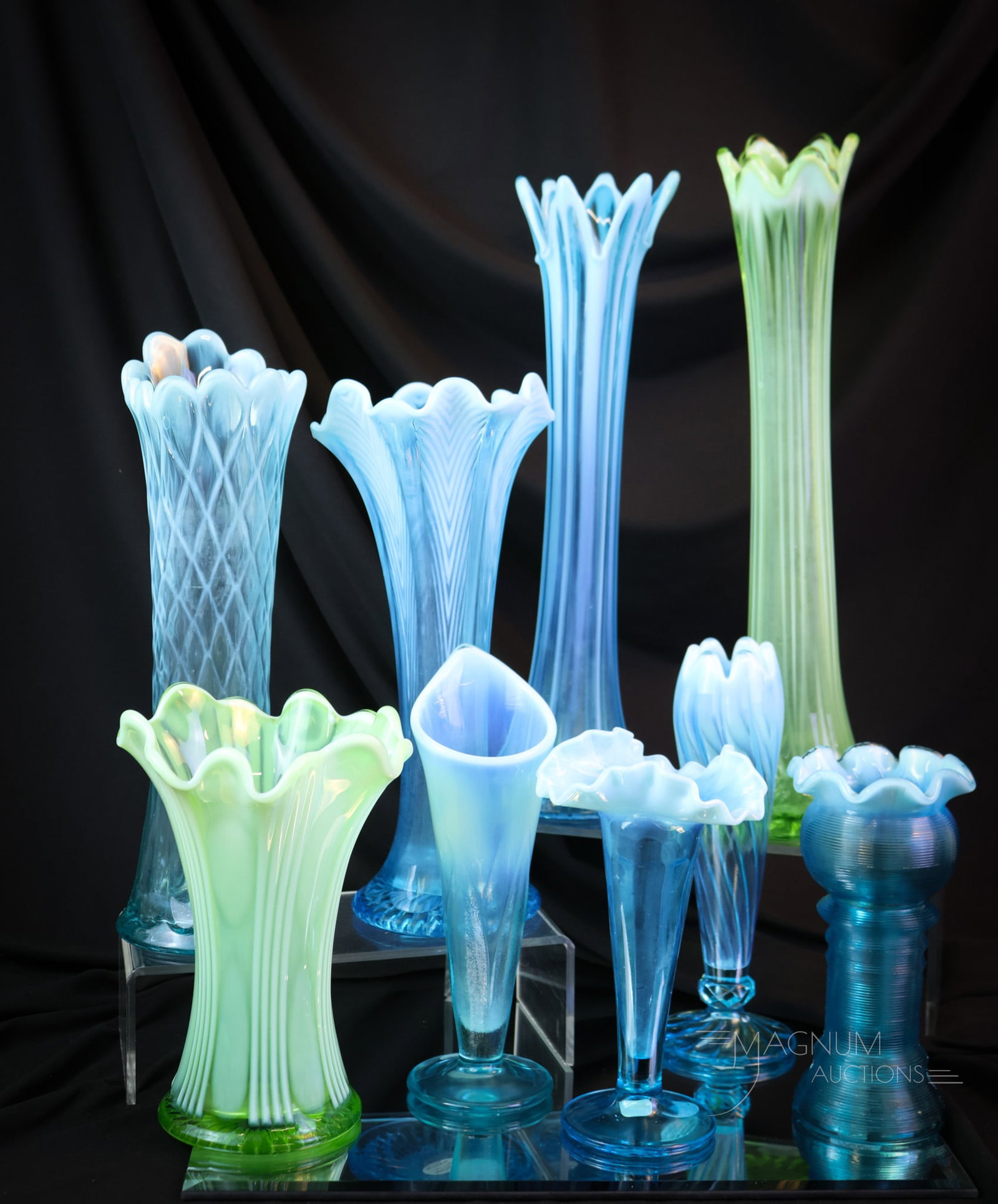 9 pc Lot Victorian Swung Opalescent & More Vases: There are three blue and two green opalescent swung vases in this lot. There are also four of the Novelty variety. Each is a sheer pleasure to behold. The tallest of the offerings measures 14 1/2". SH