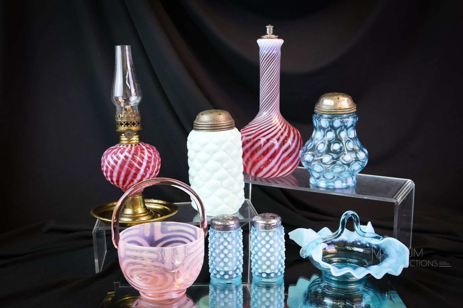 8 pc Lot Fenton Consolidated Cranberry Blue Pink Opalescent Glass & More: Eight delights to dazzle your eyes. This lot offers a pair of Fenton Hobnail blue opal shakers. A cranberry opal Reverse Swirl mini lamp base. A Fenton for L.G. Wright Stripe cranberry opal barber bot