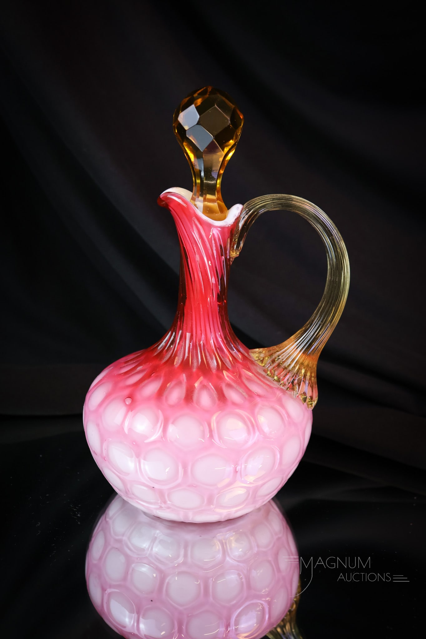 Victorian Pink Cased Phoenix Honeycomb Glass Cruet: Another beautiful find in glass attributed to Phoenix. This is a cruet complete with its original stopper in cut faceted amber. Such a wonderful piece. Will you be the new owner? This cruet measures 7
