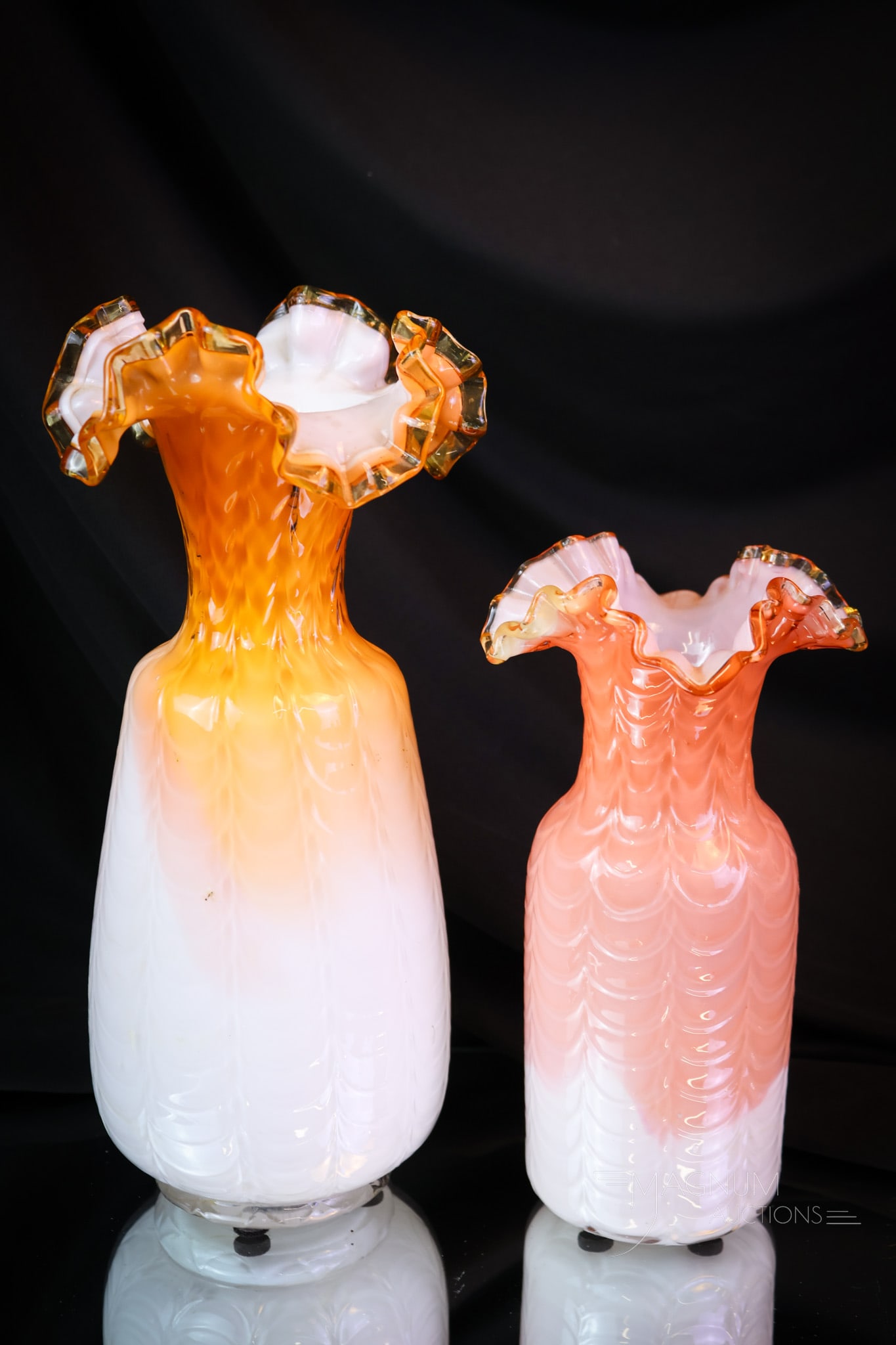 Phoenix Drape Peach Cased Victorian Glass Vases: Two very unusual peach colored examples of vases attributed to Phoenix Glass. These vases are in the Drape pattern in peach to white cased glass. The tallest of the two measures 9 3/4". SHIPPING NOTIC