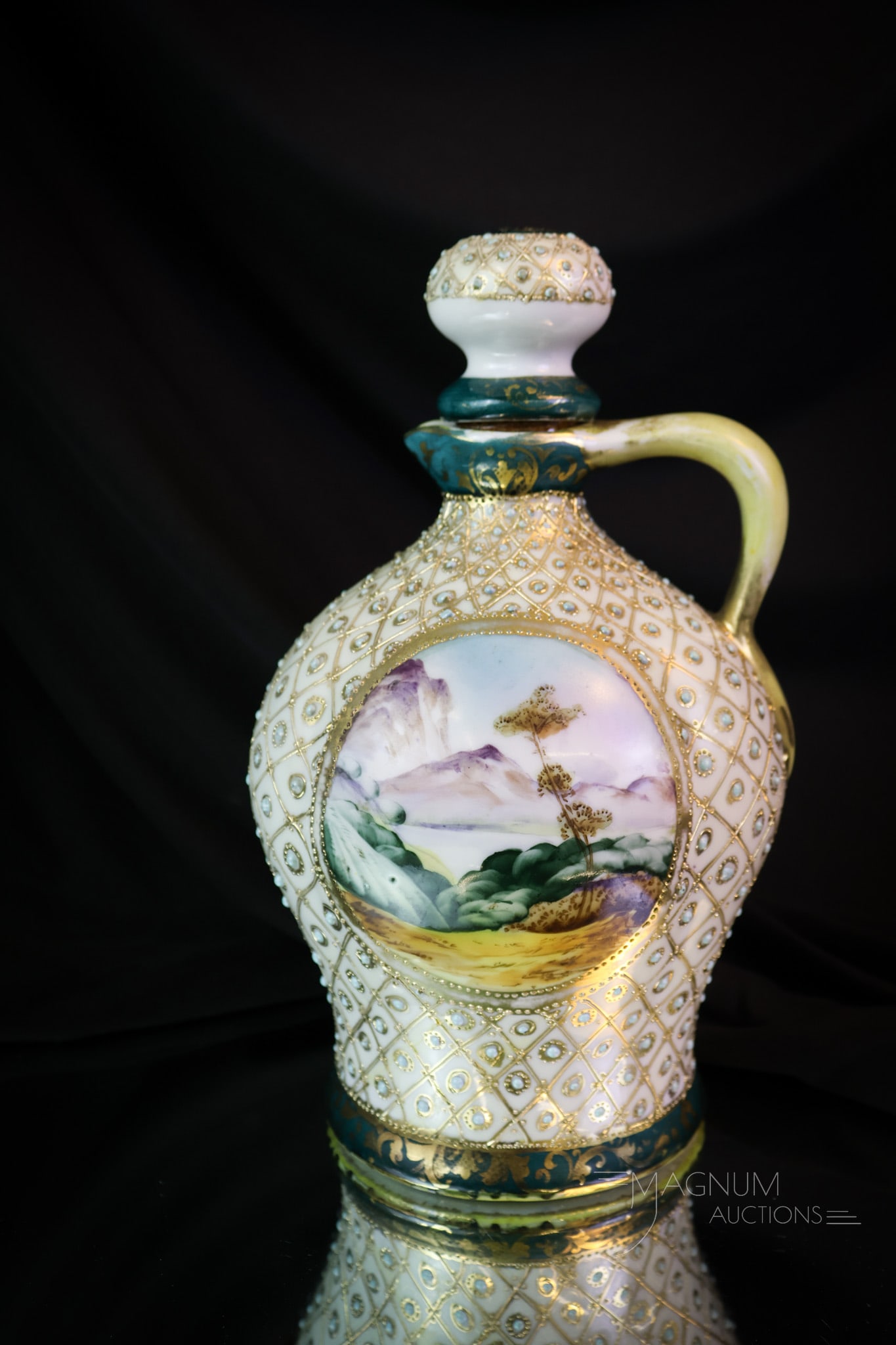 Blue Mark Nippon Mountain Scene Whiskey Jug: Here's a fine Blue Mark Nippon whiskey jug. This piece has an all-over applied blue dotted decoration. It also features a mountain scene. This fine example measures 9 1/2" tall. SHIPPING NOTICE: If yo