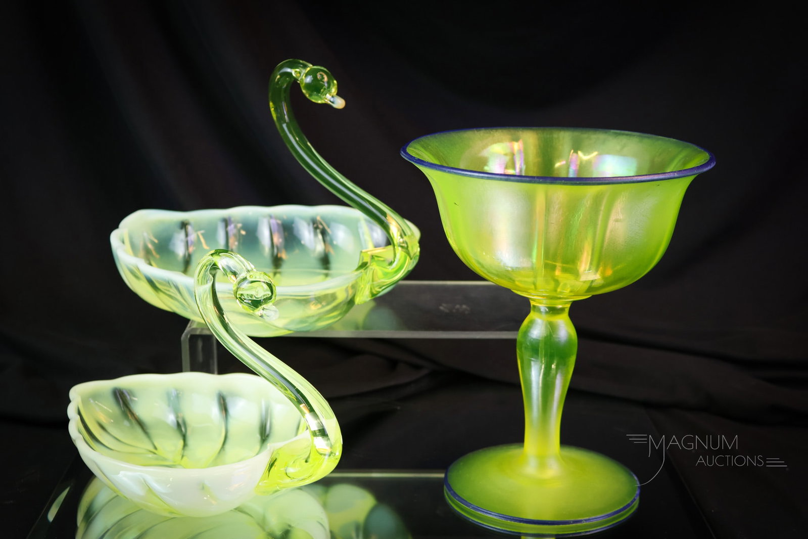 3 pc Vaseline Uranium Glass Lot of Purity: This purely vaseline uranium glass lot is sure to please all of the Vasies out there. This lot combines two opalescent Sylvan Swans by Duncan Miller with a stretch vaseline glass compote with a blue r