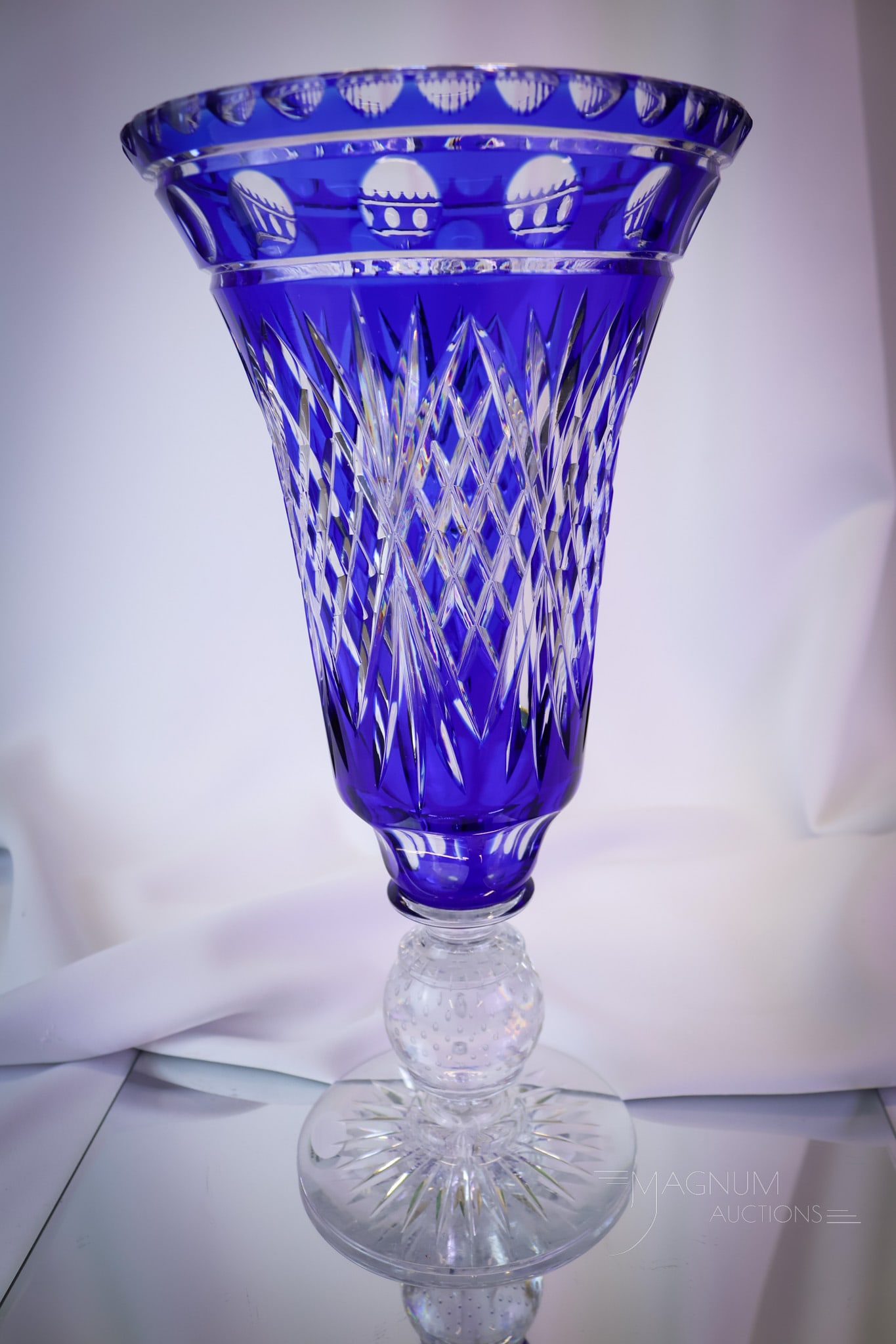 Pairpoint Lincoln Cobalt Cut-to-Clear Controlled Bubble 13" Glass Vase: A marvelous piece in our lineup of Pairpoint glass. This is a cobalt cut-to-clear Lincoln pattern Pairpoint vase in cobalt blue. This super example has perfect coloring and form. This large vase measu