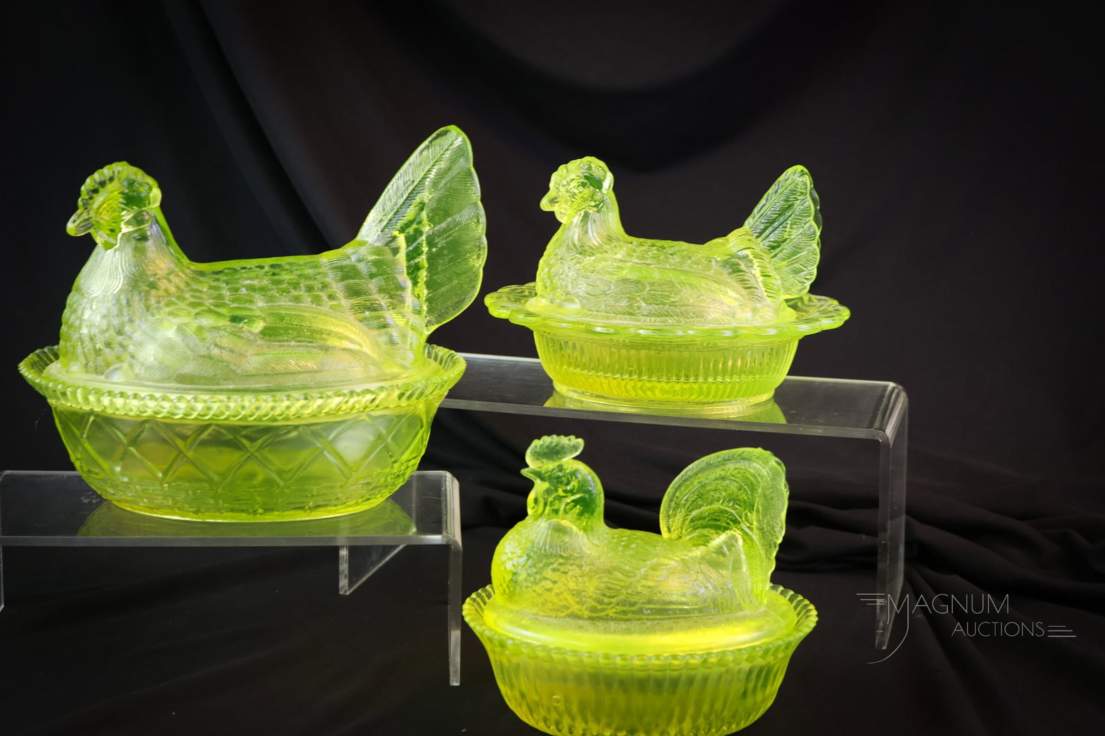 3 pc Lot Vaseline Glass Covered Chickens Mosser Boyd Westmoreland: Three brilliant vaseline glass delights. This lot includes examples by Mosser, Westmoreland, and Boyd. The tallest measures 6 1/2". SHIPPING NOTICE: If you choose not to utilize the LiveAuctioneers Li