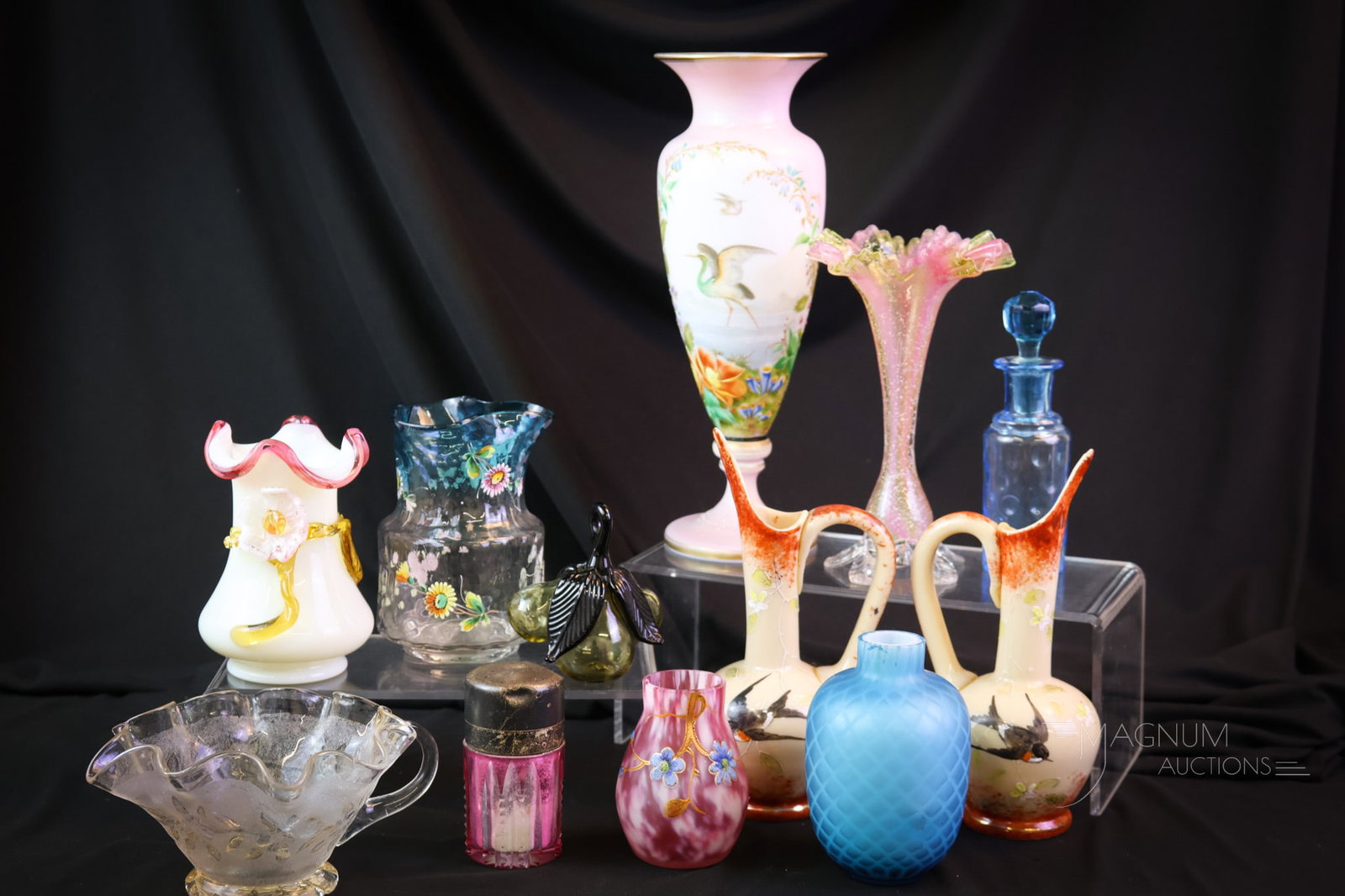 12 pc Magnum Auctions Art Glass Goody Lot: Twelve desirable finds in art glass. This lot includes examples in fireglow, decorated opaline, applied glass, and mother-of-pearl. The tallest measures 10". SHIPPING NOTICE: If you choose not to util