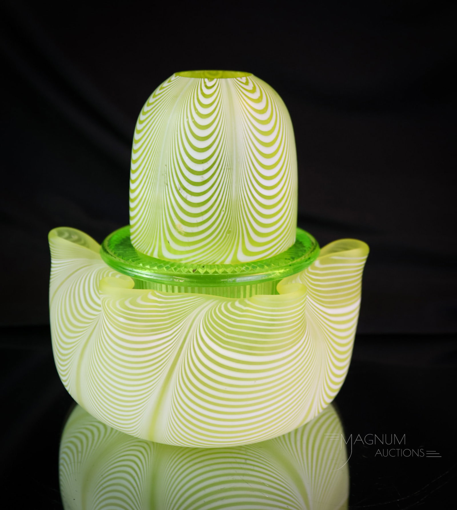 Citron Nailsea Victorian Glass Fairy Lamp: A charming find in a Victorian Nailsea citron colored fairy lamp. This fine piece features a matching base and is complete with a uranium-rich green vaseline glass candle cup. It measures 5" tall. SHI