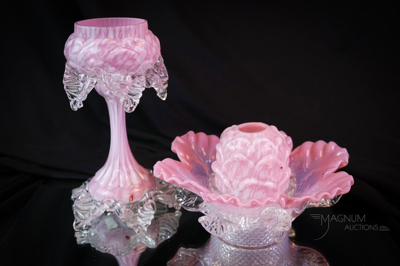 Victorian Pink Cased Glass Pedestal Applied Glass Fairy lamp: A gorgeous pink cased glass pedestal form fairy lamp, complete with the original shade and an added pleasure of an outer trim shade. This beautiful find measures 10 1/2" tall. SHIPPING NOTICE: If you 