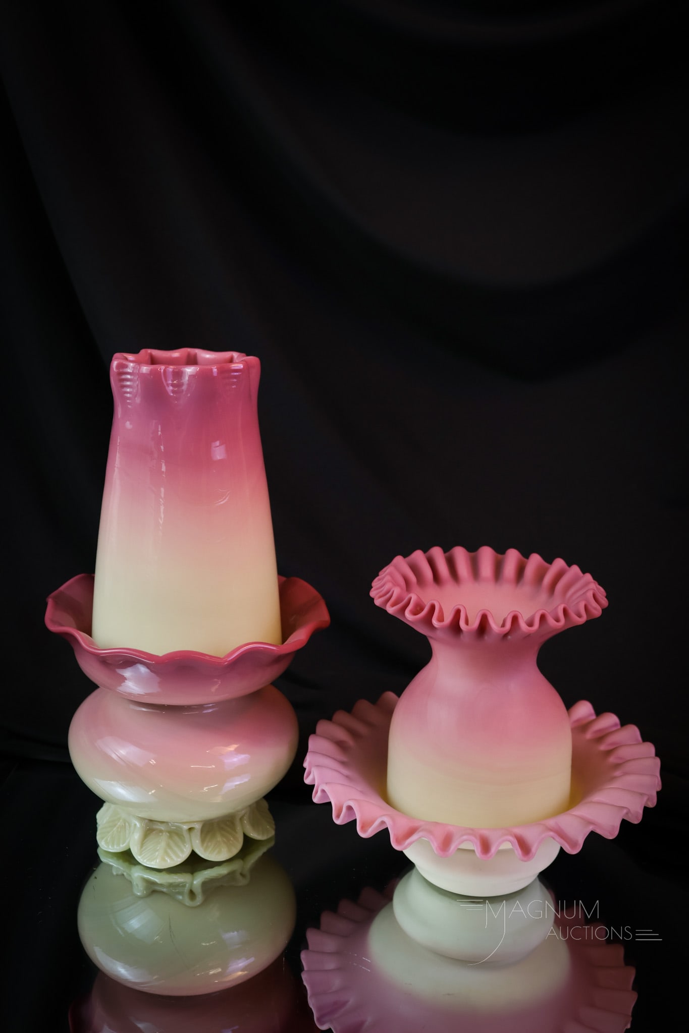 2 pc Lot Italian Uranium Burmese Glass Fairy Lamps: Two lovely examples of Uranium-rich Italian glass fairy lamps. One with a ruffled top rim and base with a satin finish. The other with a slender, tall shade and applied fan feet on the base. This one 