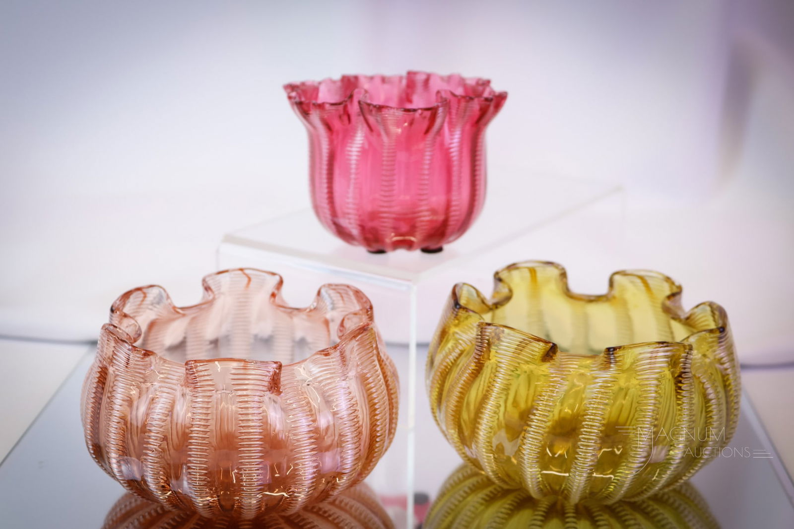 3 pc Lot Stevens & Williams Glass Jewel Line Victorian Rose Bowls: Three select finds in Stevns & Williams Victorian glass rose bowls in the Jewel line. One in amber. One in pink. The last is in ruby. The tallest measures 2 3/4". SHIPPING NOTICE: If you choose not to
