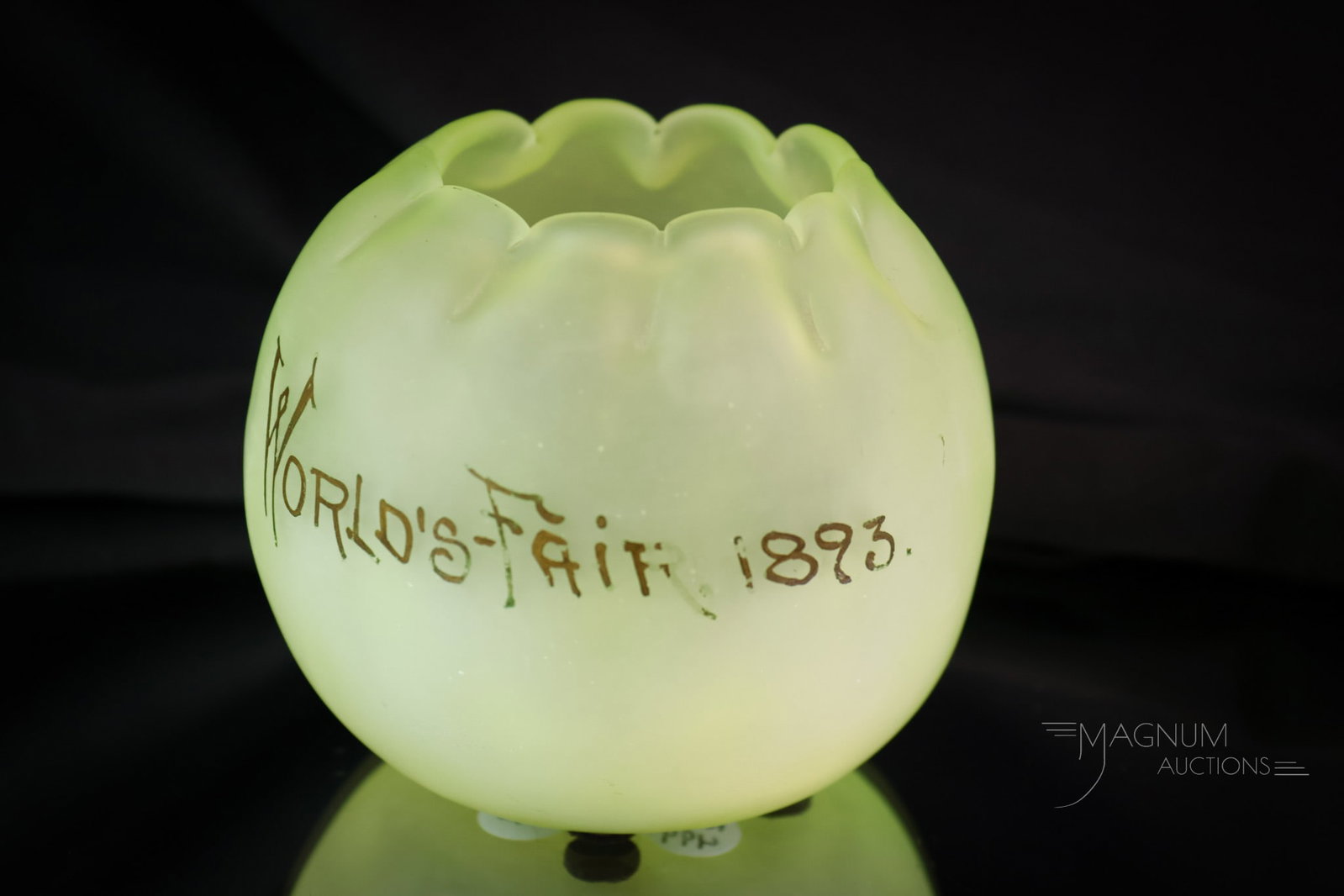 Libbey Victorian "World's Fair 1893" Vaseline Uranium Satin Glass Rose Bowl: A rare find in a vaseline satin uranium-rich glass Victorian rose bowl. This is a souvenir piece of the "1893 World's Fair." This super example lights up brightly under black light. It measures 3 1/4"