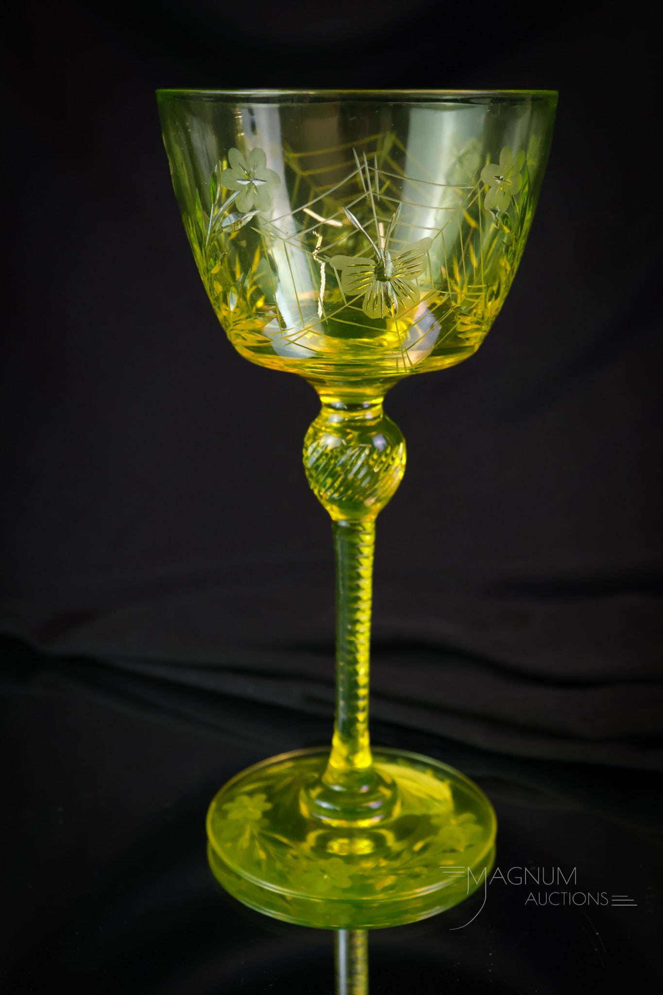 Pairpoint Vaseline Uranium Engraved Glass Colias Cocktail Stem: Here's a lovely. We'll have a drink for this one! This is a Pairpoint vaseline uranium engraved glass Colias pattern cocktail stem. This piece is a must-have for your collection! The stem measures 7"