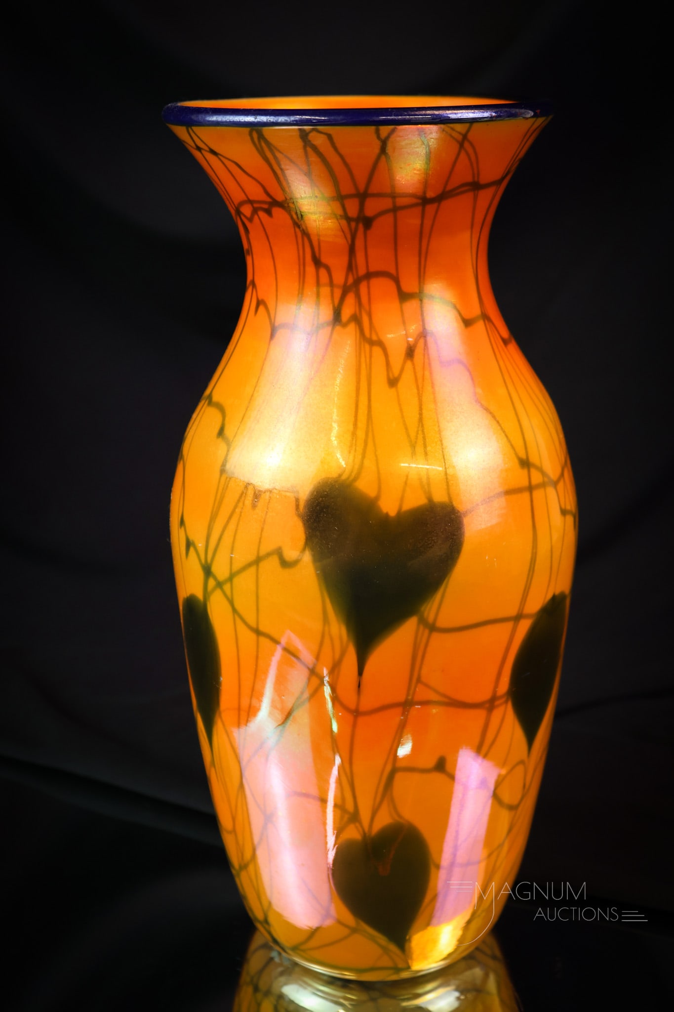 Imperial Freehand Lead Lustre Orange Iridescent Heart & Vine Art Glass Vase: This is nice! This is an Imperial freehand orange iridescent lead lustre vase with a heart and vine decoration. This piece has an applied blue rim and dark blue hearts and vines. The vase measures 10 