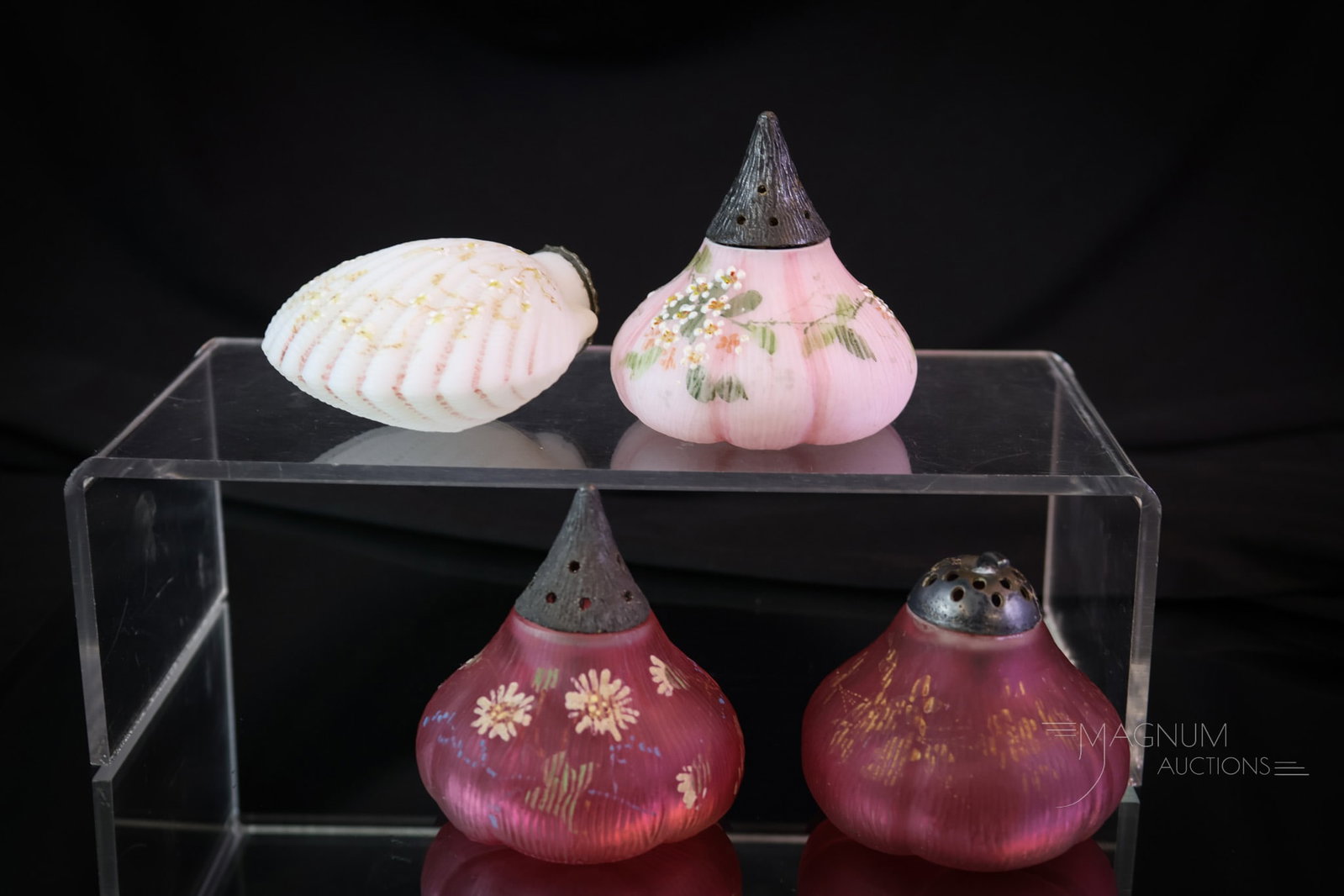 4 pc Lot Mt. Washington Victorian Glass Cranberry & More Salt Shakers: Four distinct salt shakers make up this way more than generous lot of Mt.Washington Victorian Glass salt shakers. This lot includes two figs. One with a regular top and one with a disguised stem top. 