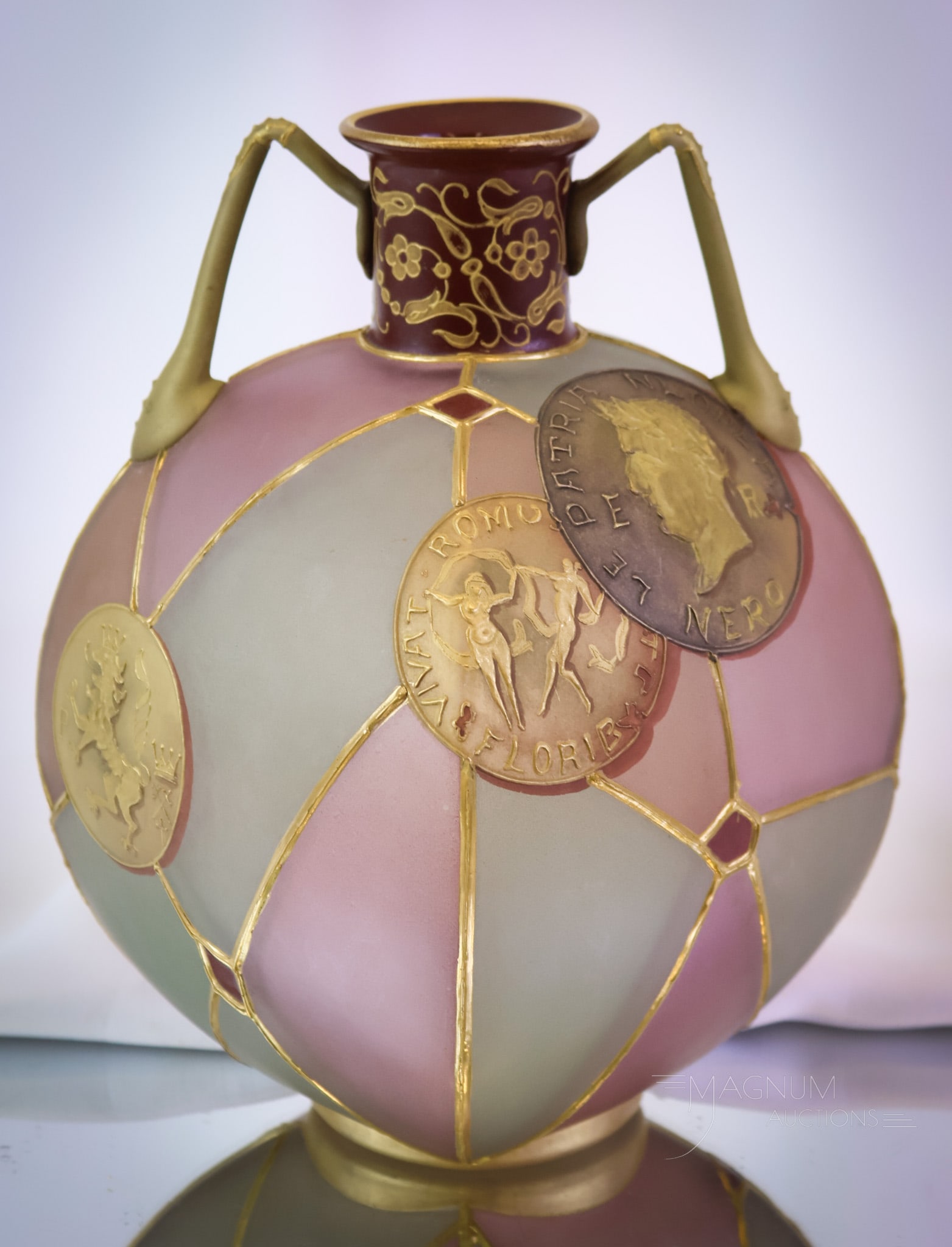 Mt. Washington Royal Flemish Victorian Art Glass Vase: An excellent example of Mt. Washington Royal Flemish glass. This vase features delicate handles and the desirable coin decoration. Beautiful colors around this fine vase. This vase measures 8 1/2" tal