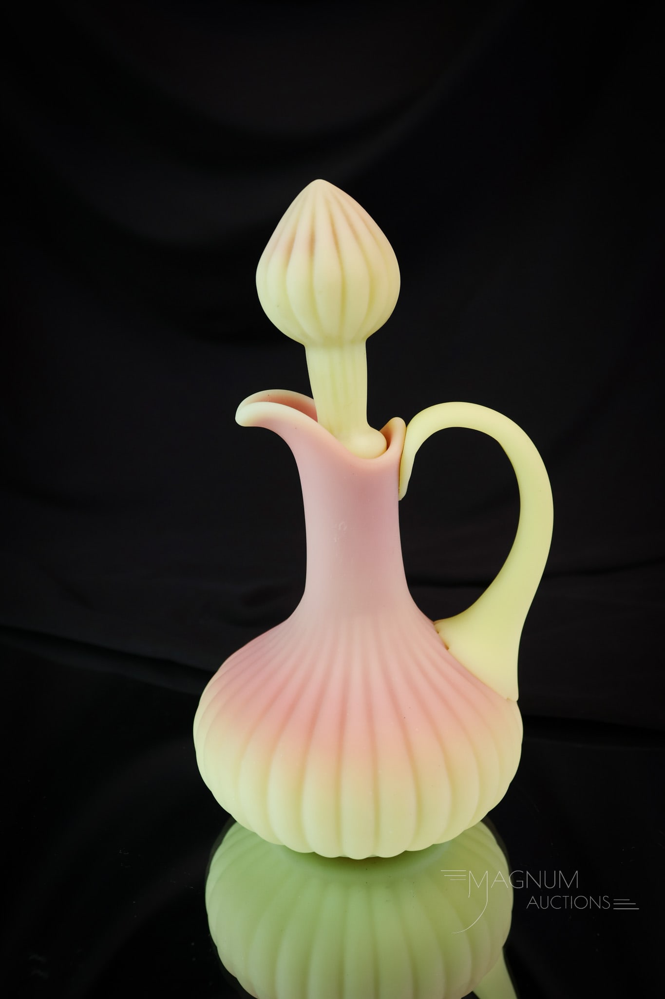 Mt. Washington Victorian Uranium Burmese Art Glass Ribbed Cruet: Always a find, and the Uranies will tell you it will glow. This ribbed for visual pleasure cruet measures 7" tall. Perfect coloring. SHIPPING NOTICE: If you choose not to utilize the LiveAuctioneers L
