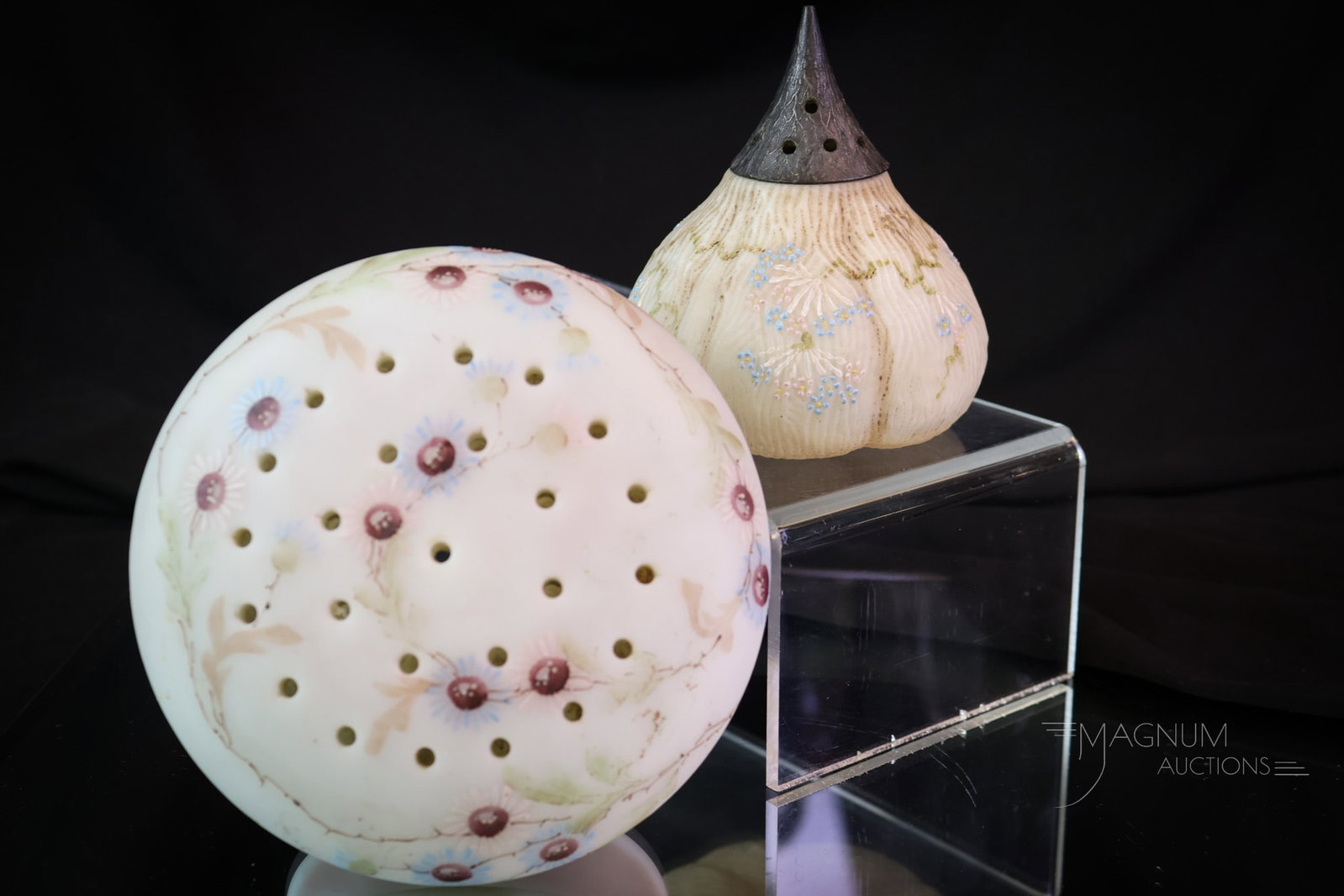 2 pc Lot Mt. Washington Victorian Glass Sugar Shakers: two wonderful additions to any collection. This lot offers two Mt. Washington Victorian Glass sugar shakers. Well, one could be a flower frog also. Each is beautifully decorated with florals. The tall