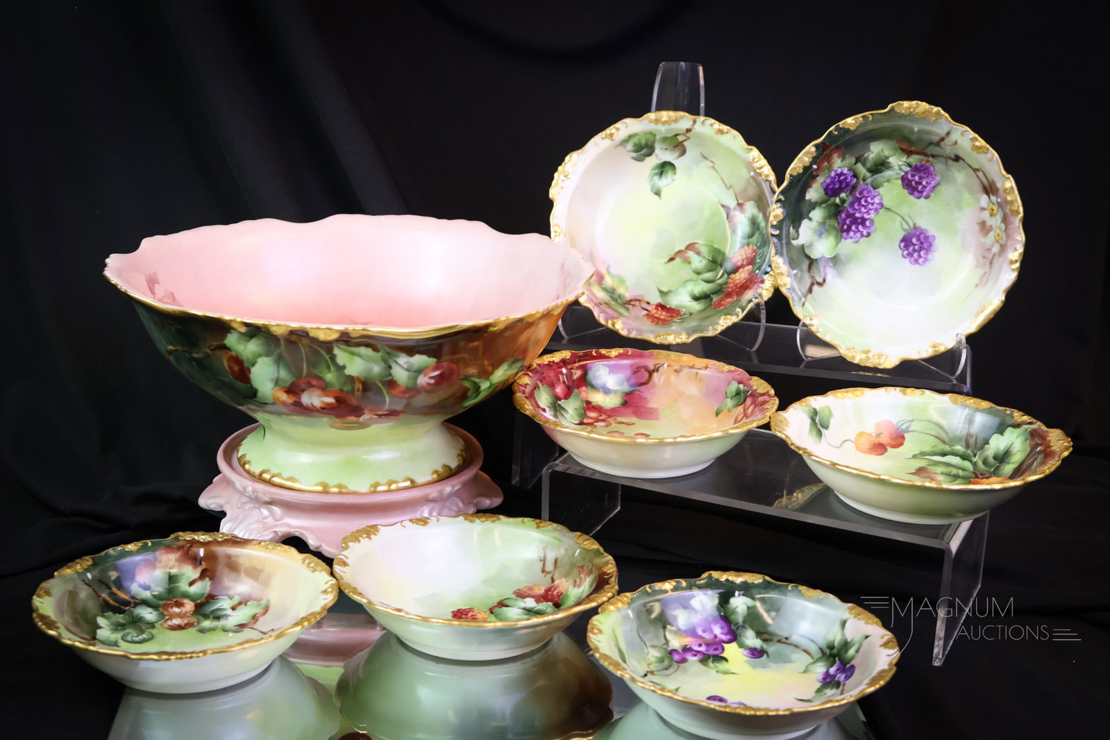 9 pc JPL France Limoges Hand Painted Porcelain Berry Set: What a lovely set this is. This is a marked JPL France Limoges berry set. It is lavishly decorated with gold and cherries. This set is complete with the plinth for the master bowl. The tallest measure