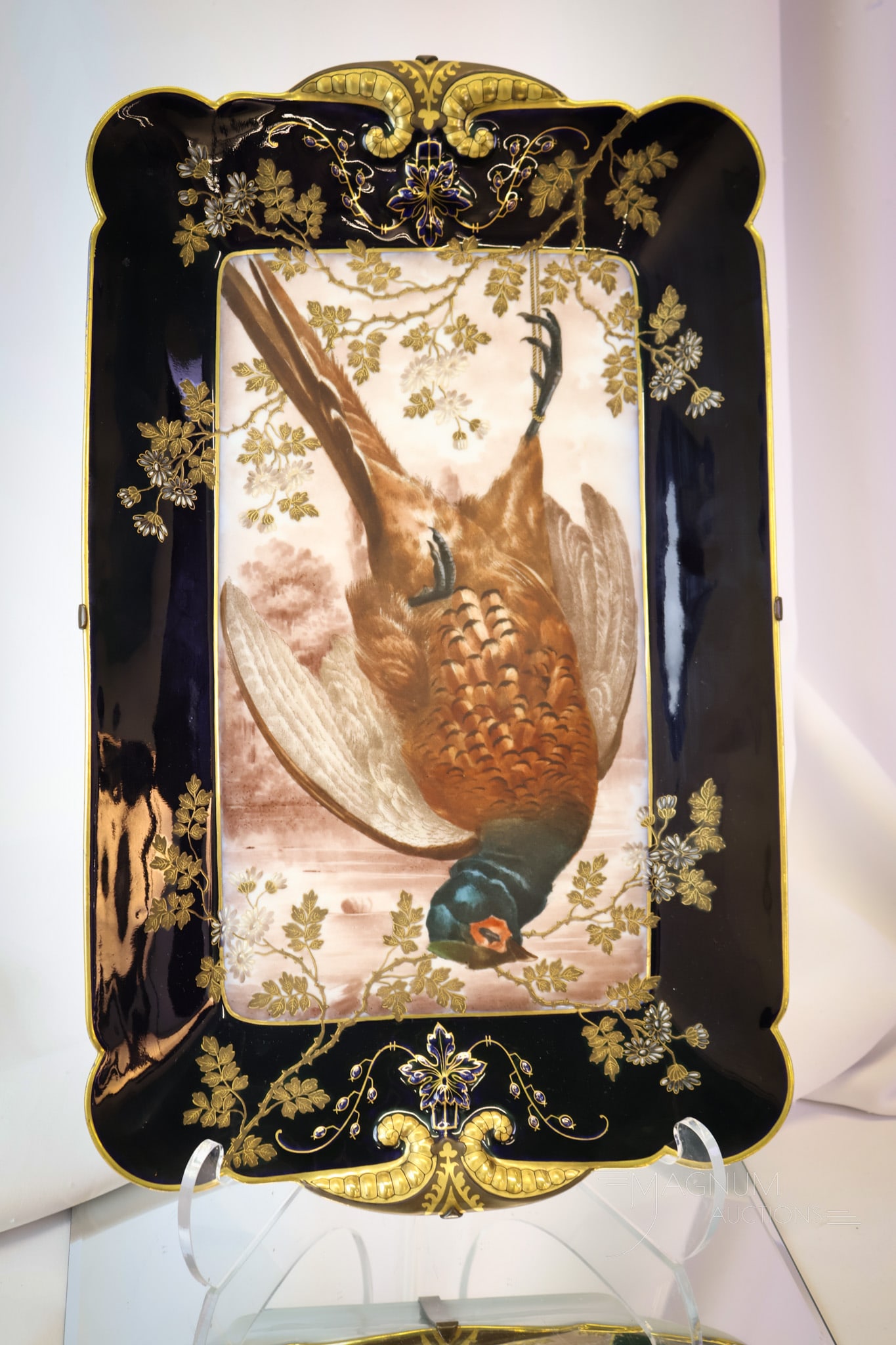 CFHGDM Hand Painted Porcelain Rectangular Game Pheasant Platter: A wonderful find. This is a game platter with hand-painted pheasant decoration. This rectangular piece is fitted with a custom antique wall-mounting bracket. The platter is signed on the back side, "C