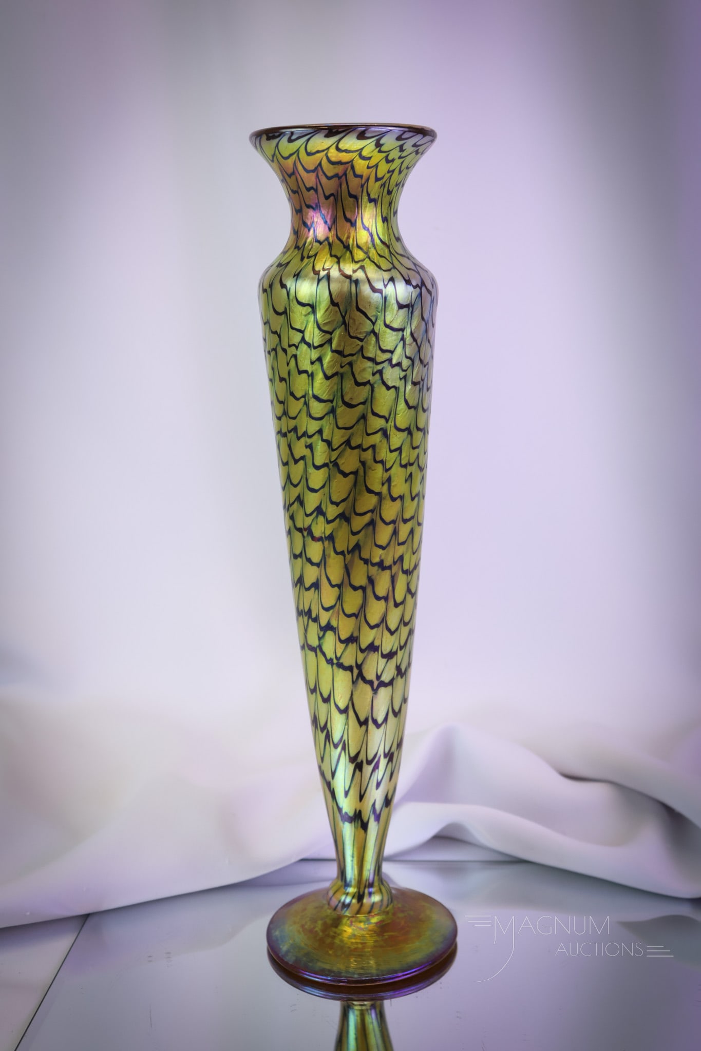 Signed Lundberg Studios 2005 "Red Indian Basket Magnum Heart" Art Glass Vase: This is a signed Lundberg Studios, 2005, iridescent art glass vase. This beautiful example was titled, "Red Indian basket Magnum Heart" by the company. The vase has a striking gold iridescence. The pi