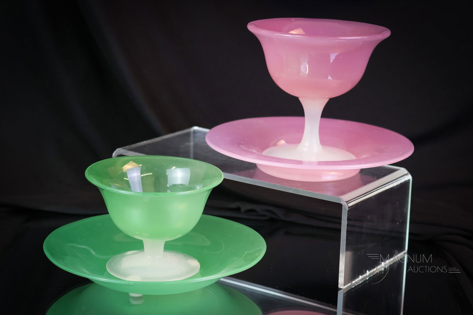 2 pc Lot Steuben Jade Rosaline Alabaster Sherberts & Underplates: Two beautiful finds in Steuben art glass. Each is a complete ensemble of a sherbert with an underplate. One example in jade & Alabaster. The other in Rosaline and Alabaster. The largest measures 4 1/2