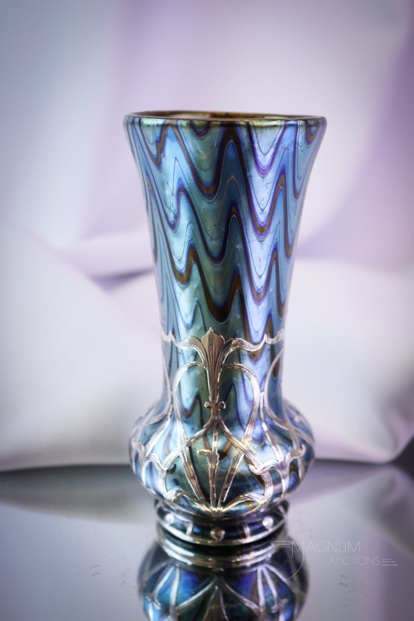 Loetz Sterling Silver Overlay Rubin Phaenomen Genre PG6893 Cabinet Vase: A gorgeous Loetz cabinet vase. This vase is in the Rubin Phaenomen Genre PG6893. Electric color and wonderful silver. The vase measures 4 3/4" tall. SHIPPING NOTICE: If you choose not to utilize the L