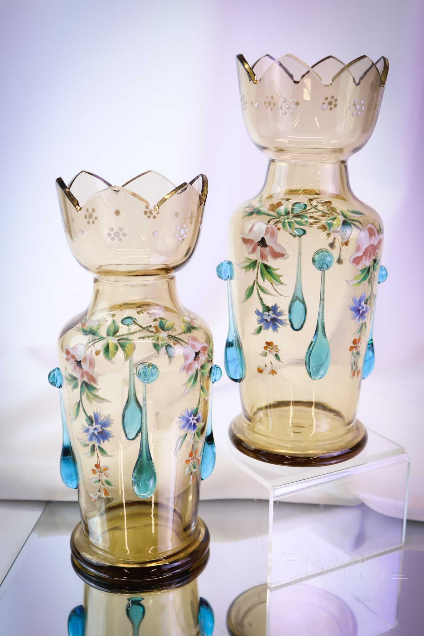 Pair Bohemian Applied Glass Victorian Enameled Glass Mantle vases: A wonderful pair of Victorian mantle vases with applied tadpole decoration. Each is further decorated with enameled florals. Each vase has a cut rim. The pair measures 9" tall and 3 1/4" wide. Each va