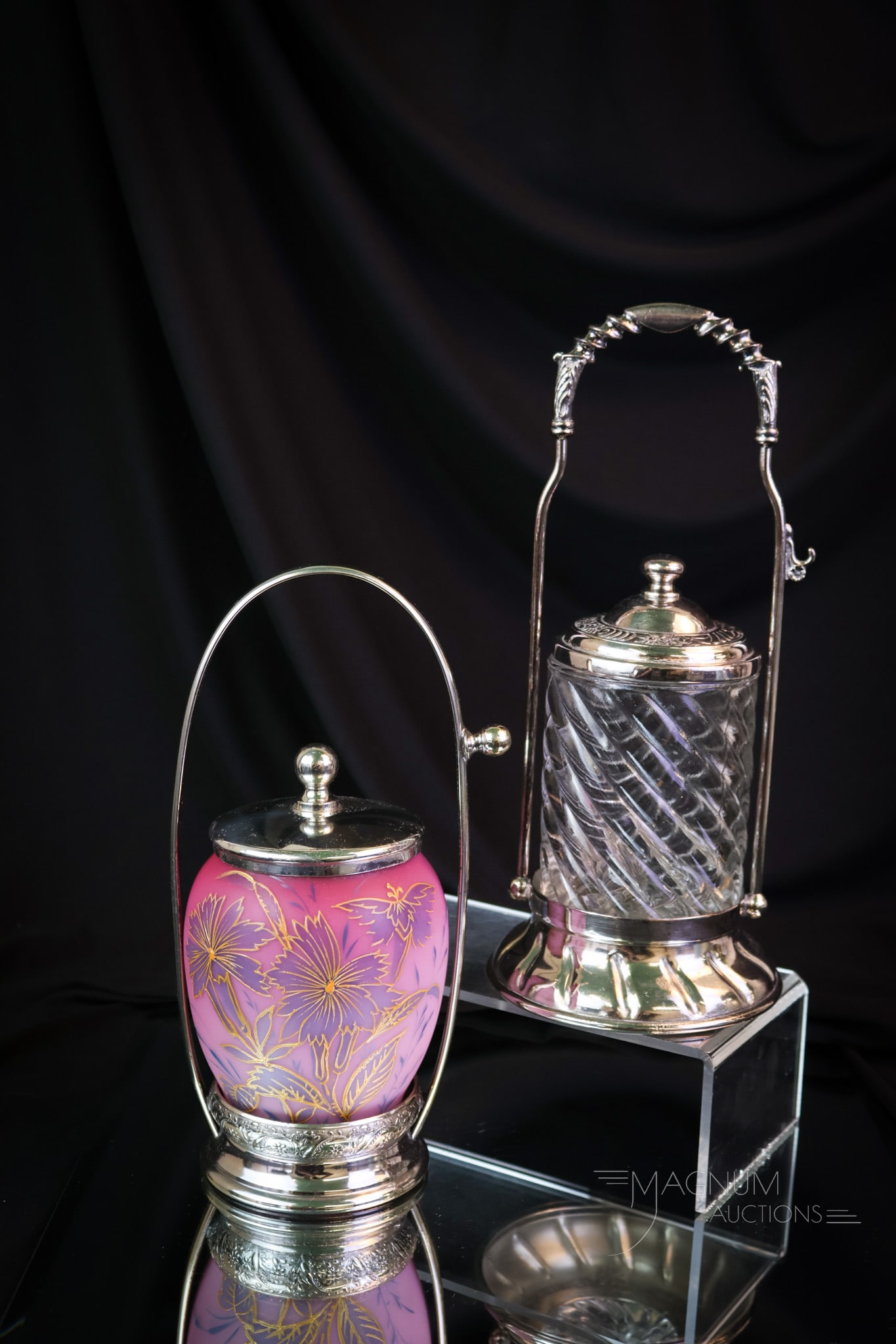 2 pc Lot Victorian Silverplate Peachblow & More Glass Pickle Castors: Two fine examples of pickle castors of the Victorian period. This lot combines a clear example with one with a peachblow enameled jar. The clear castor bears a signature on the frame of S.F. Myers & C