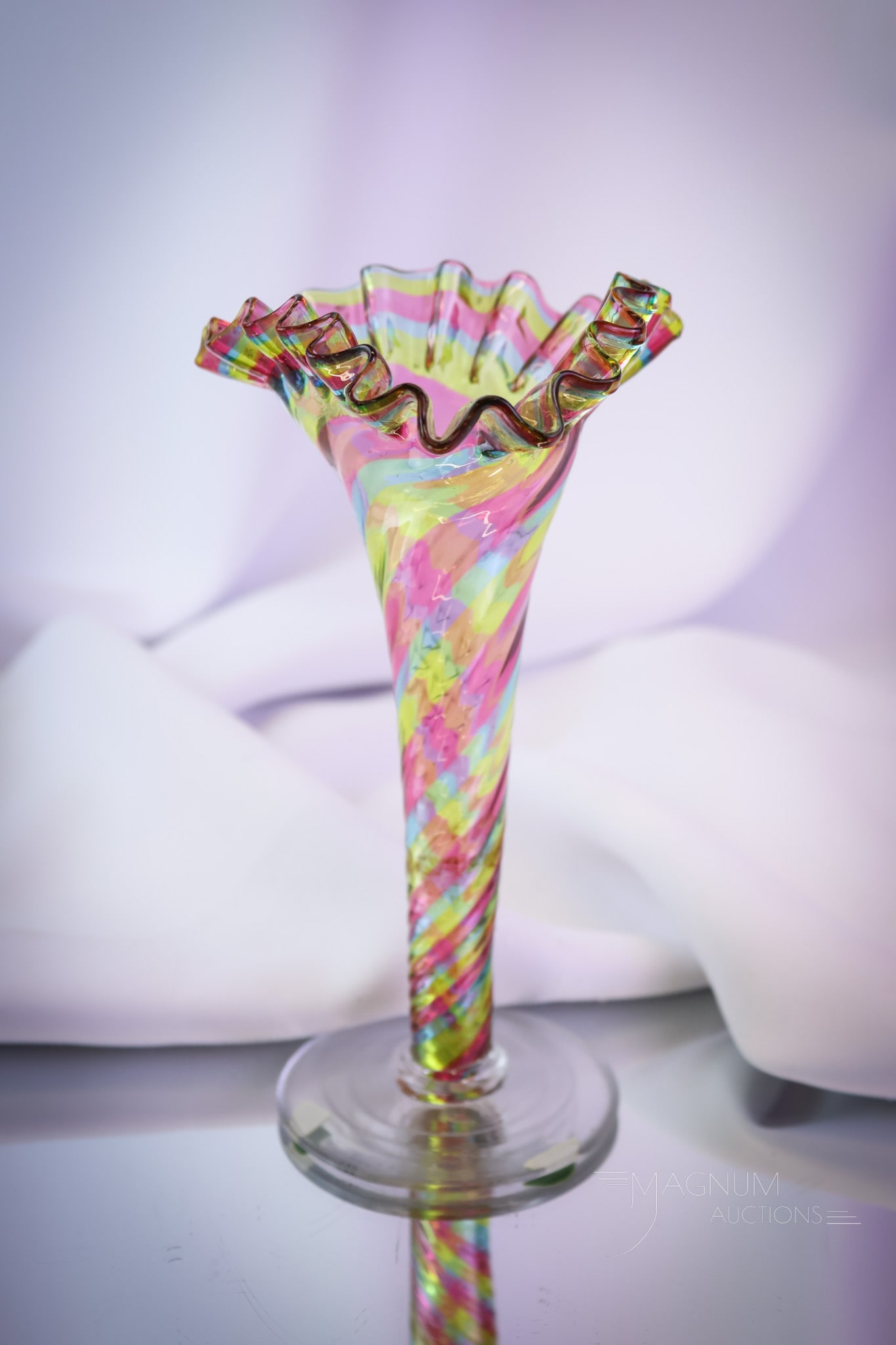Victorian Vivid Rainbow Glass Lily Vase: Gorgeous colors encompass this fine little 6 3/4" tall lily vase. This piece features a tightly crimped top rim. Only the best at Magnum Auctions! SHIPPING NOTICE: If you choose not to utilize the Liv