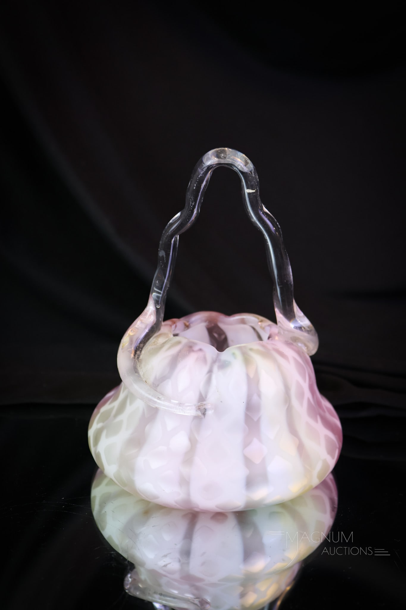 Victorian Rainbow Mother of Pearl Art Glass Basket: A wonderful find in Victorian mother-of-pearl Webb art glass. This is a rainbow basket with an applied tendril handle. It is marked "Patent" on the base. The basket measures 5 1/2" tall and 4 1/2" wid