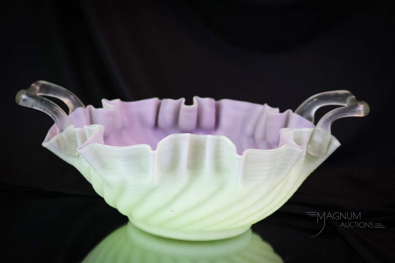 Victorian Lavender Celadon Green Mother of Pearl Double Handle Brides Bowl: A wonderful find in Victorian mother-of-pearl of pearl satin glass. This is a celadon green bowl in a swirl pattern with a lavender cased interior. This bowl has dual handles. A rare find for your col
