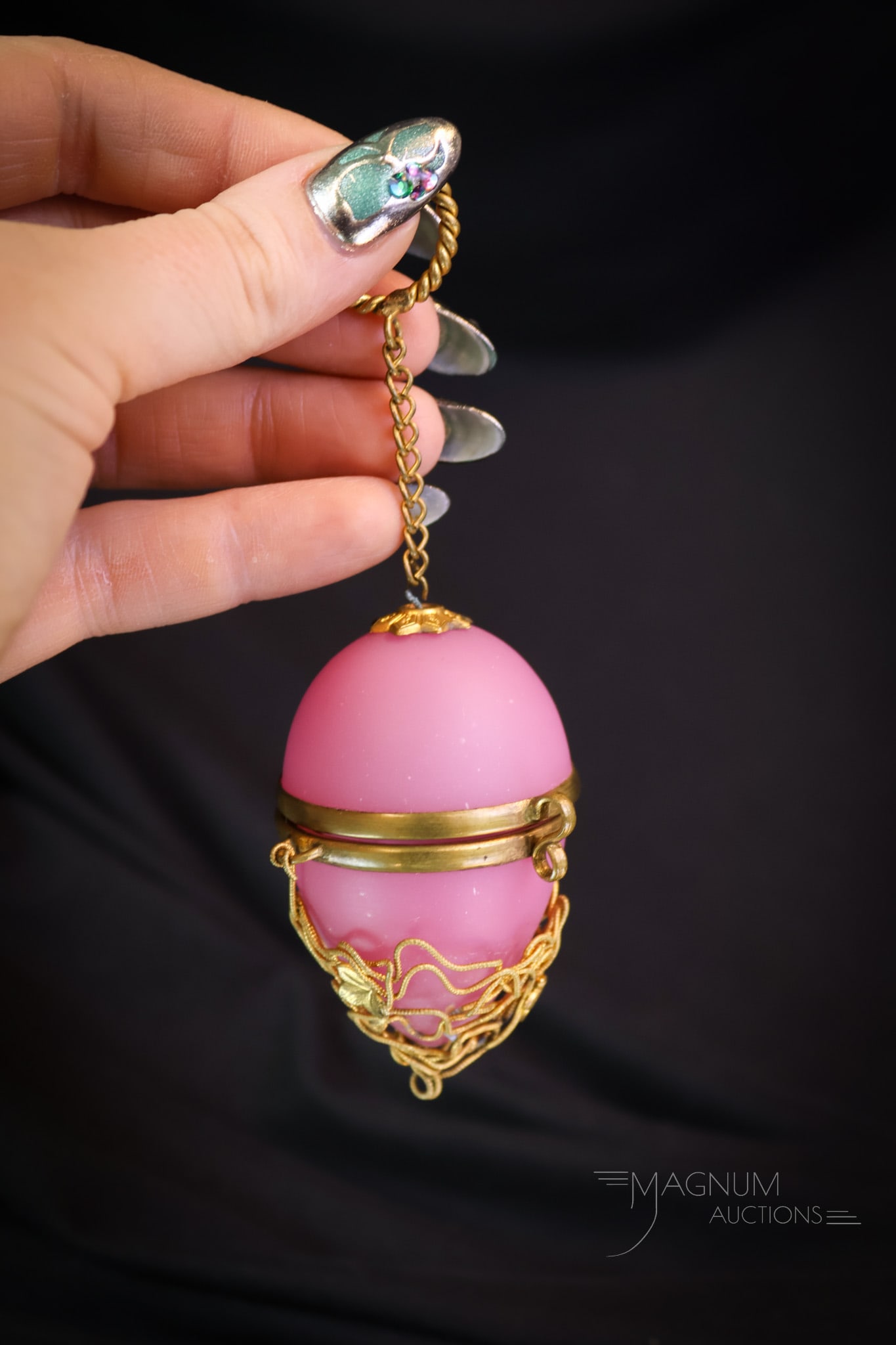 Victorian Palais Royale Pink Opaline Glass Egg-Shaped Perfume Holder: What a fun piece this is. We sold one of these a while back. This is a quintessentially Victorian piece. This is an egg-shaped perfume bottle holder in the Palais Royale style. This piece has decorati