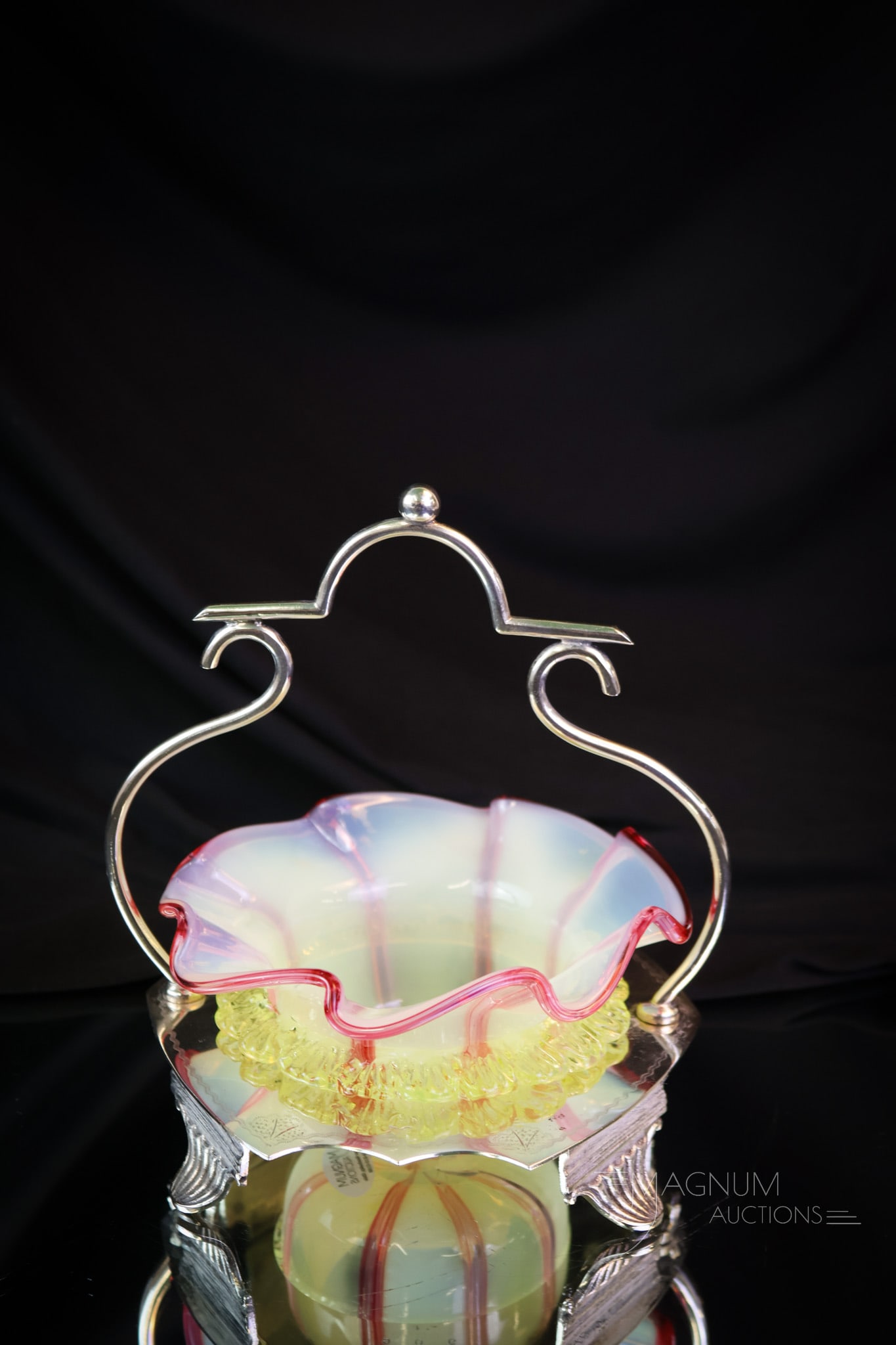 English Victorian Silverplate &Uranium Vaseline Art Glass Sweetmeat: Here's a beauty! This is an English Victorian sweetmeat complete in its silverplate holder. The insert is uranium vaseline glass with applied rigaree and contrasting red stripes. It measures 6 1/2" ta