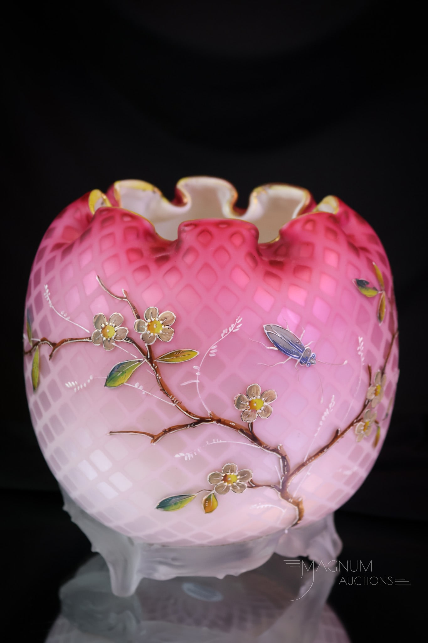 Huge Victorian Mother of Pearl Decorated Glass Uranium Rose Bowl: What a find this piece is! This large and in charge rose bowl measures 7" tall and 6 3/4" wide. It has impressive, delicate enameled and gilt work. The rose bowl has applied thorny feet. It glows brig