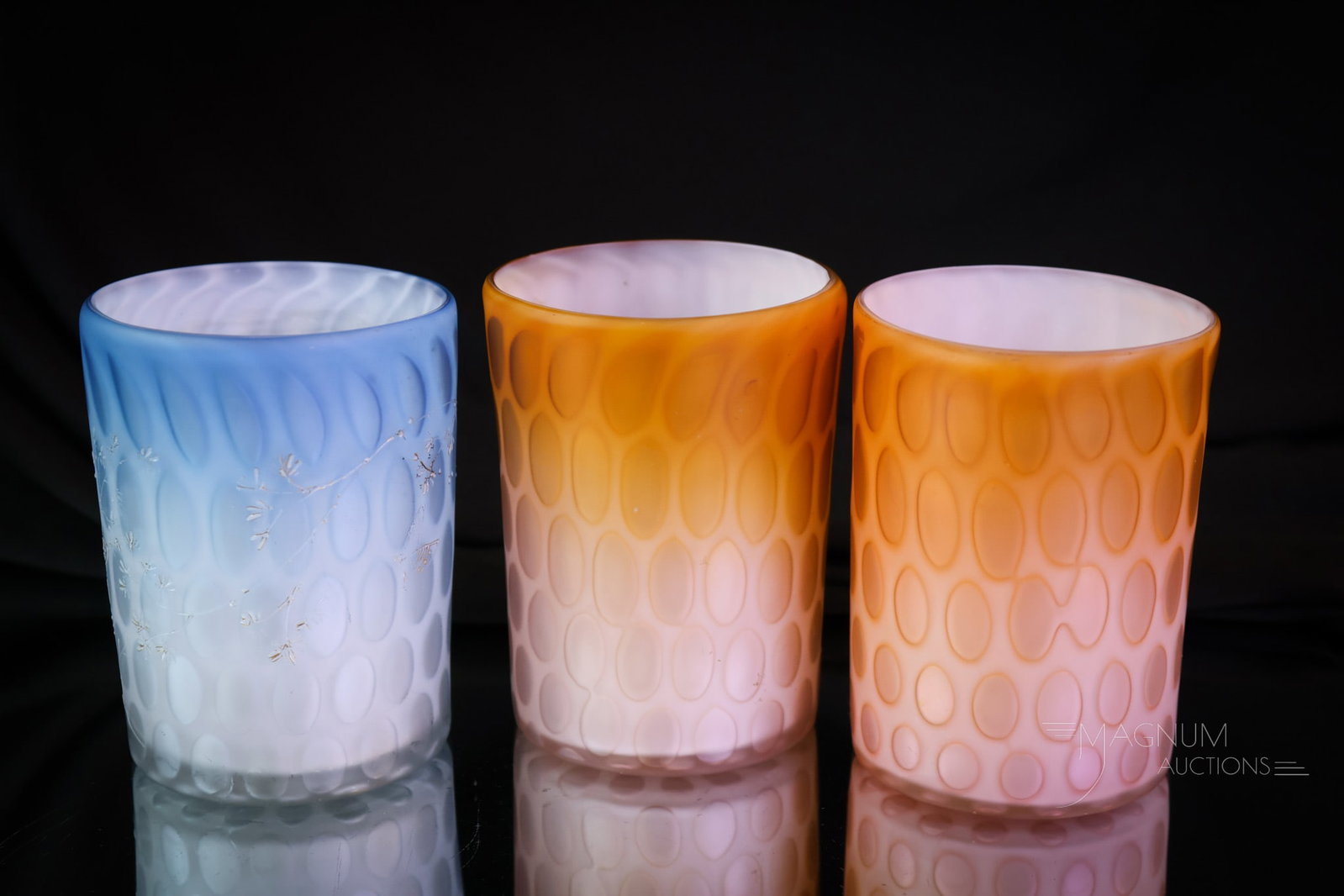 3 pc Lot Victorian Mother of Pearl Satin Glass Tumblers: A highly collectible offering of three Victorian mother-of-pearl satin glass tumblers. This lot includes one decorated and two plain examples. The tallest measures 3 3/4". SHIPPING NOTICE: If you choo