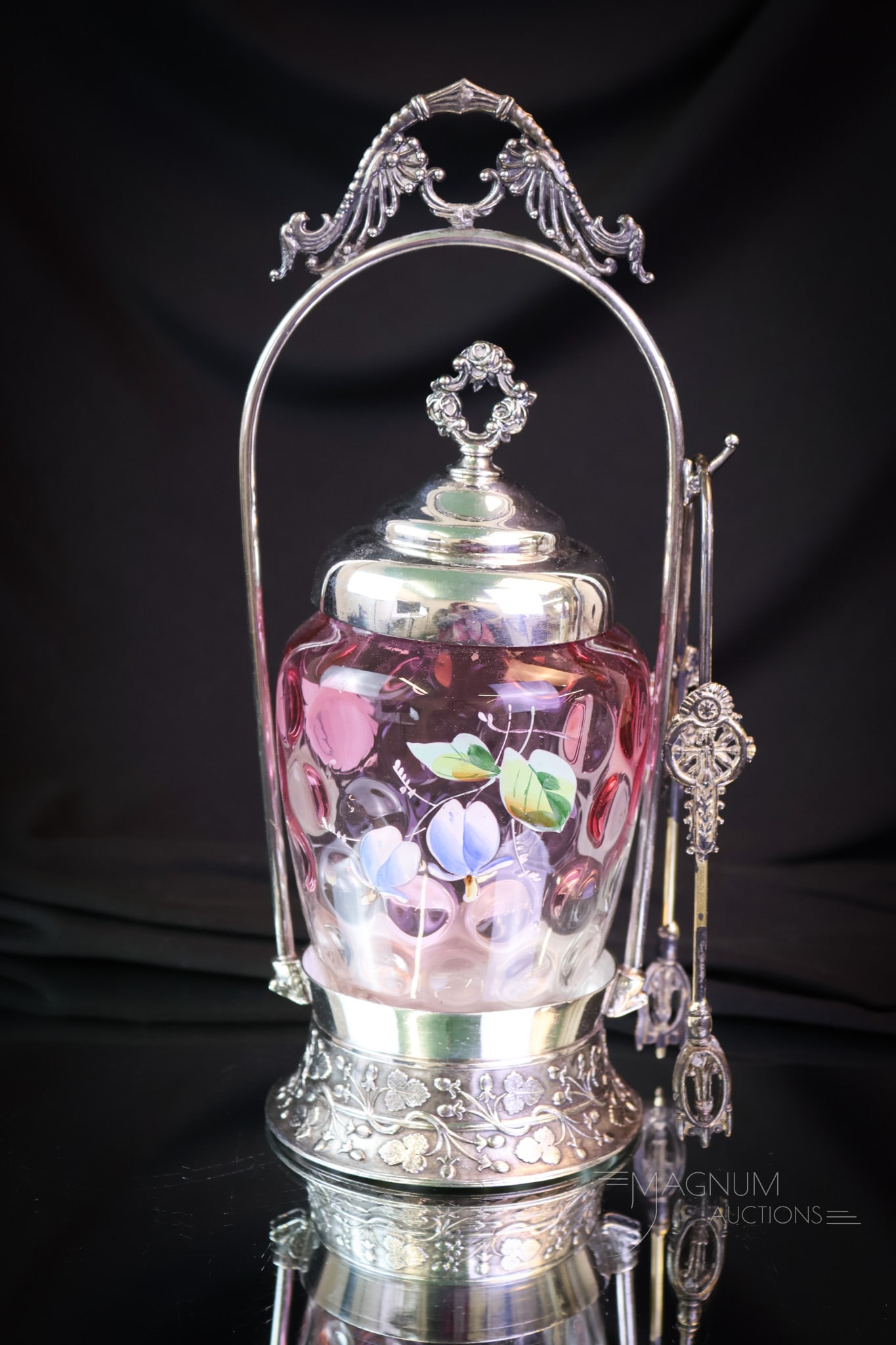 Victorian Cranberry Rubina Enameled Glass Poole Silverplate Pickle Castor: Here's a lovely. This is a signed Poole silverplate Victorian pickle castor. It is complete with a cranberry rubina enamel decorated pickle jar. The jar is decorated with florals around the body. The