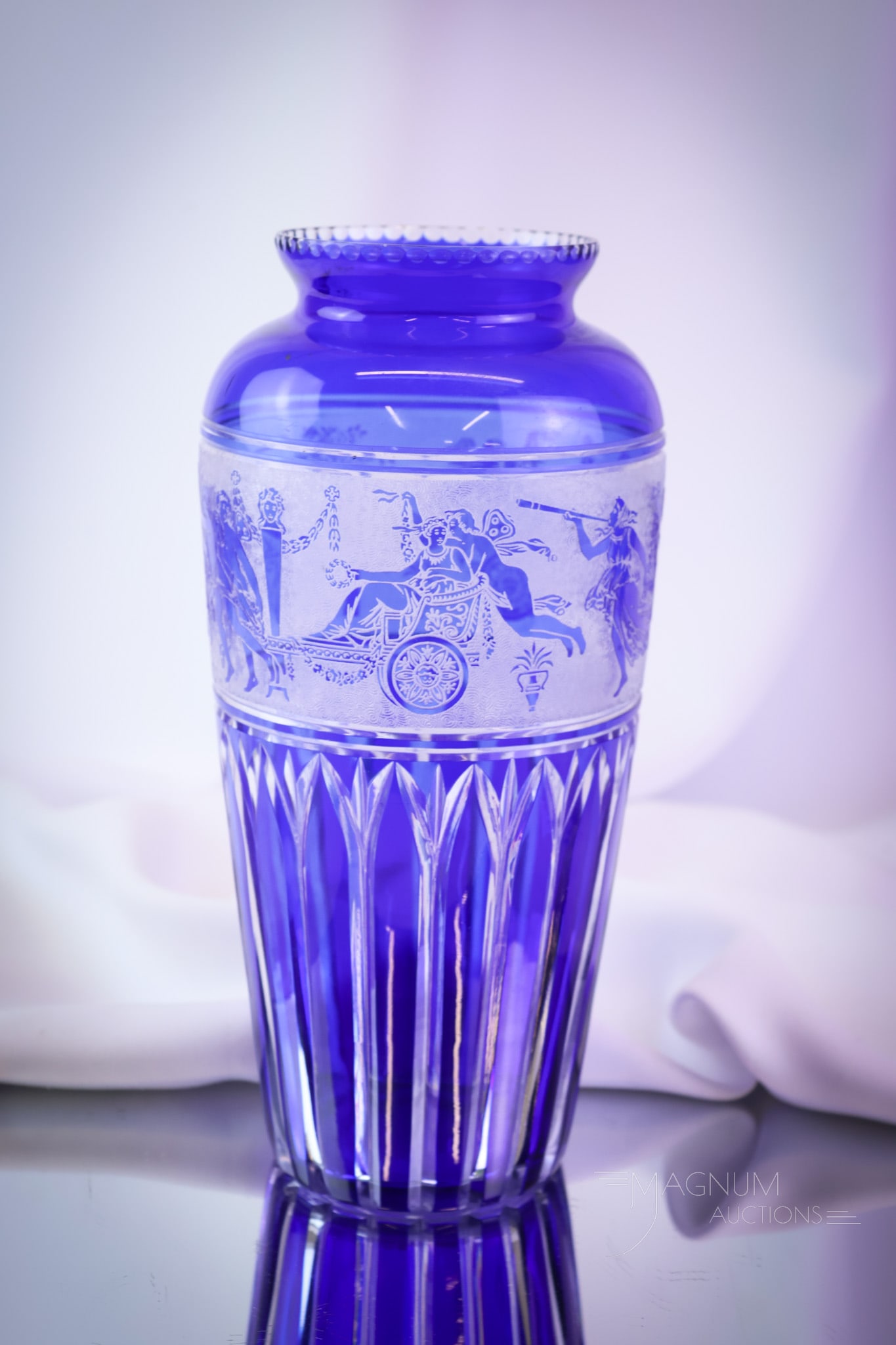 Val St. Lambert Victorian Roman Frieze Cut to Clear Vase: A striking find in Val St. lambert glass. This piece is in cobalt cut to clear. It is decorated with a Roman frieze band. The vase measures 10" tall. SHIPPING NOTICE: If you choose not to utilize the 
