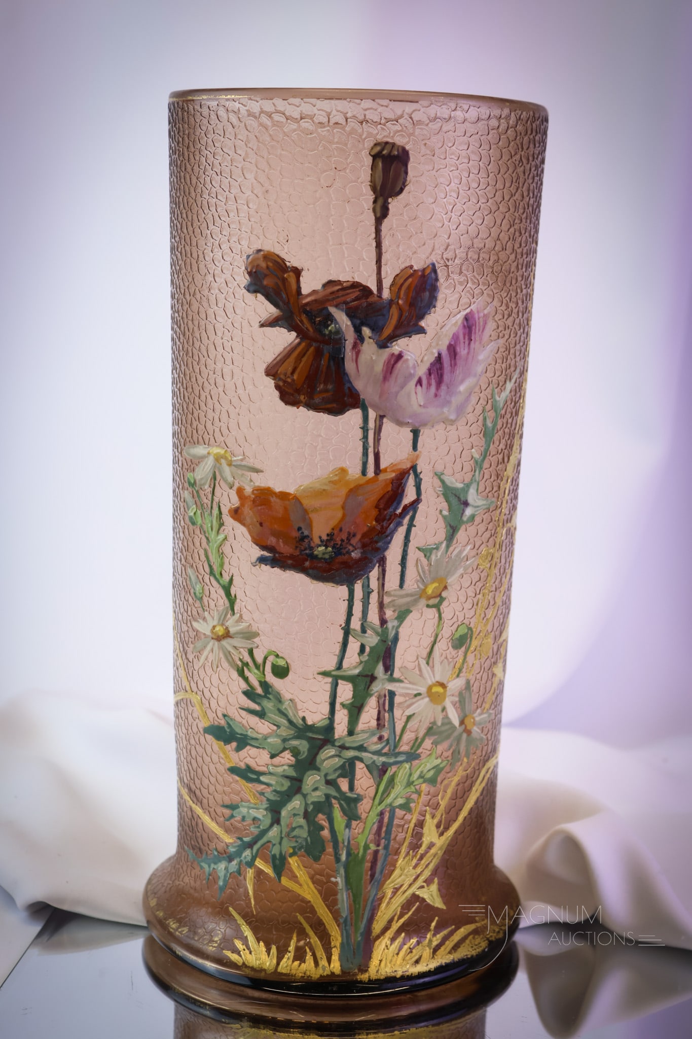 Massive Legras Mt. Joye Victorian Gilt & Enameled Glass 13 1/2" Vase: A pastel raisin Victorian enameled acid cut finish massive vase. This unusual find almost has an elephant skin texture to the glass. It is decorated in heavy enameled flowers and foliage with gilt hig
