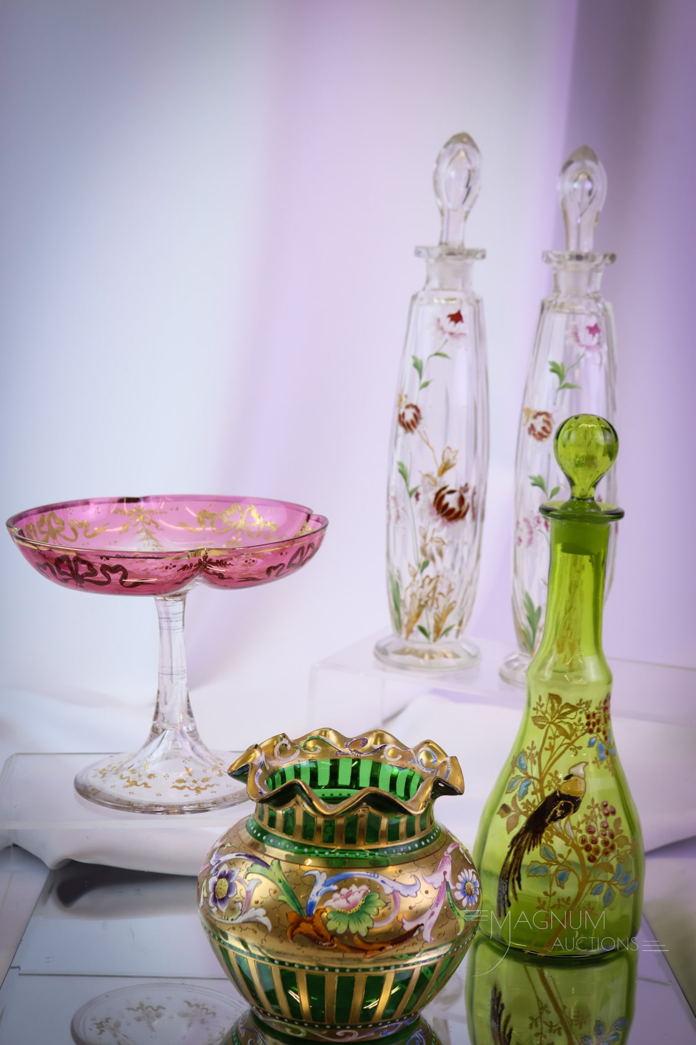 5 pc Lot Bohemian Enameled Art Glass Cologne & More: Five selections in Victorian Bohemian enameled glass that are sure to please. This lot includes a pair of cologne bottles with airtrap stoppers. An enameled olive green cologne with a bird. There are 