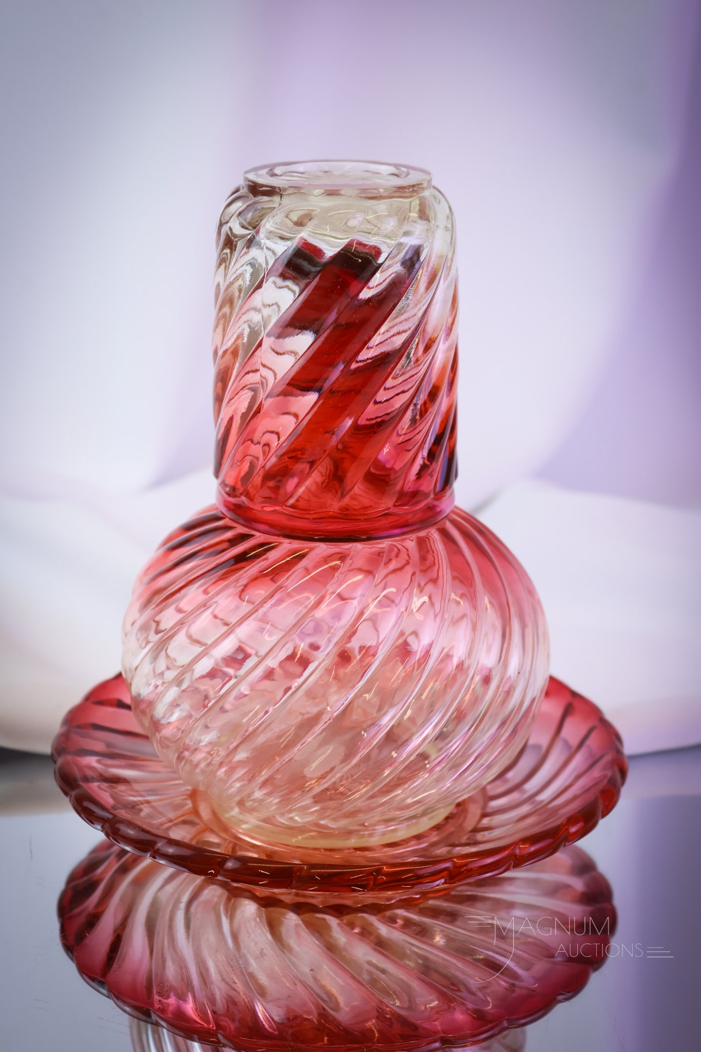 Baccarat Rose Tiente Swirl French Crystal Tumble-Up Night Set: A very nice find in Baccarat Rose Tiente French crystal. This is a tumble-up night set in the swirl pattern. This set includes the caraffe, tumbler, and underplate. The set mesures 8 3/4" tall and 7"
